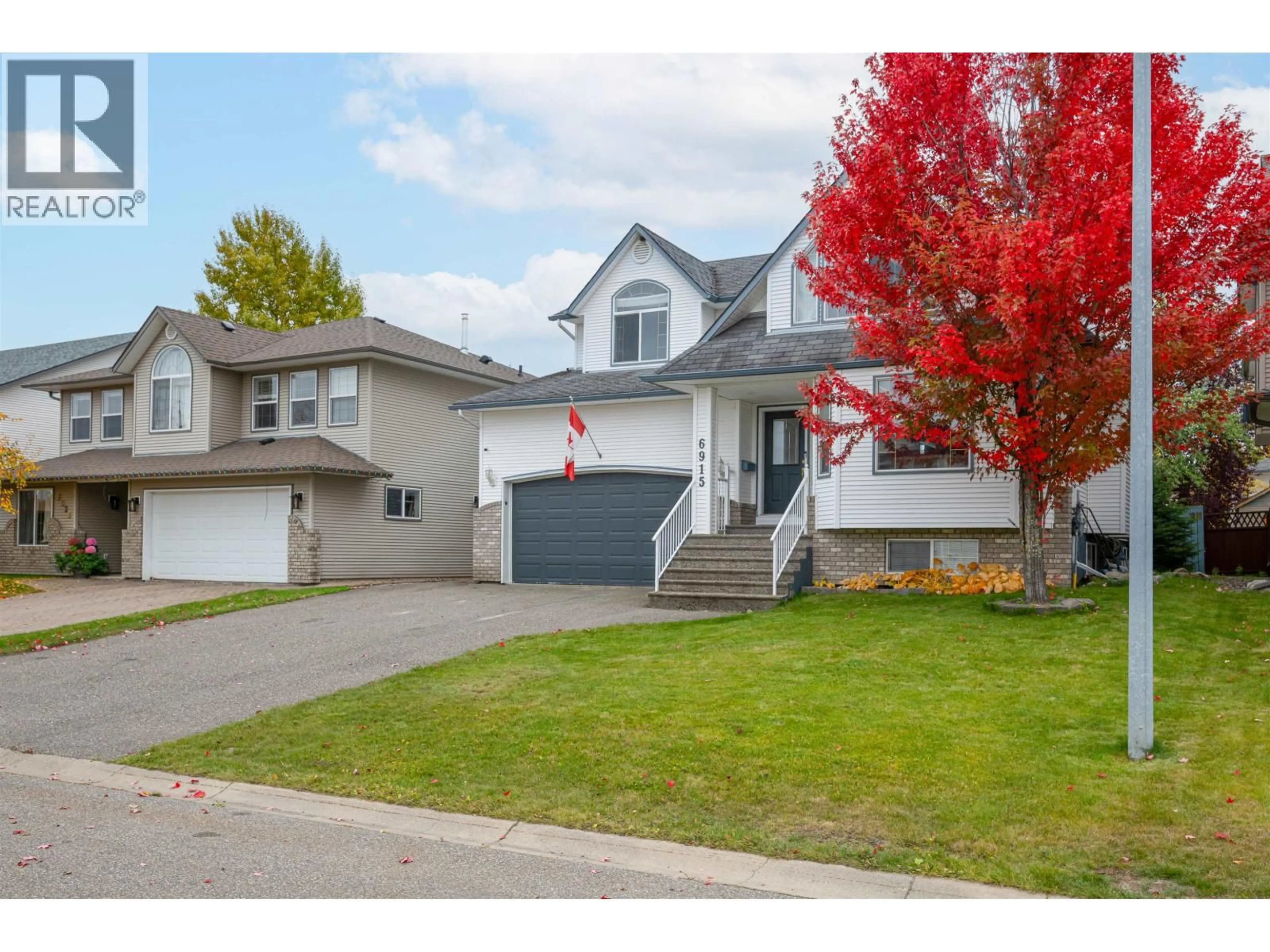 Home with vinyl exterior material, street for 6915 CHARTWELL CRESCENT, Prince George British Columbia V2N6Y3