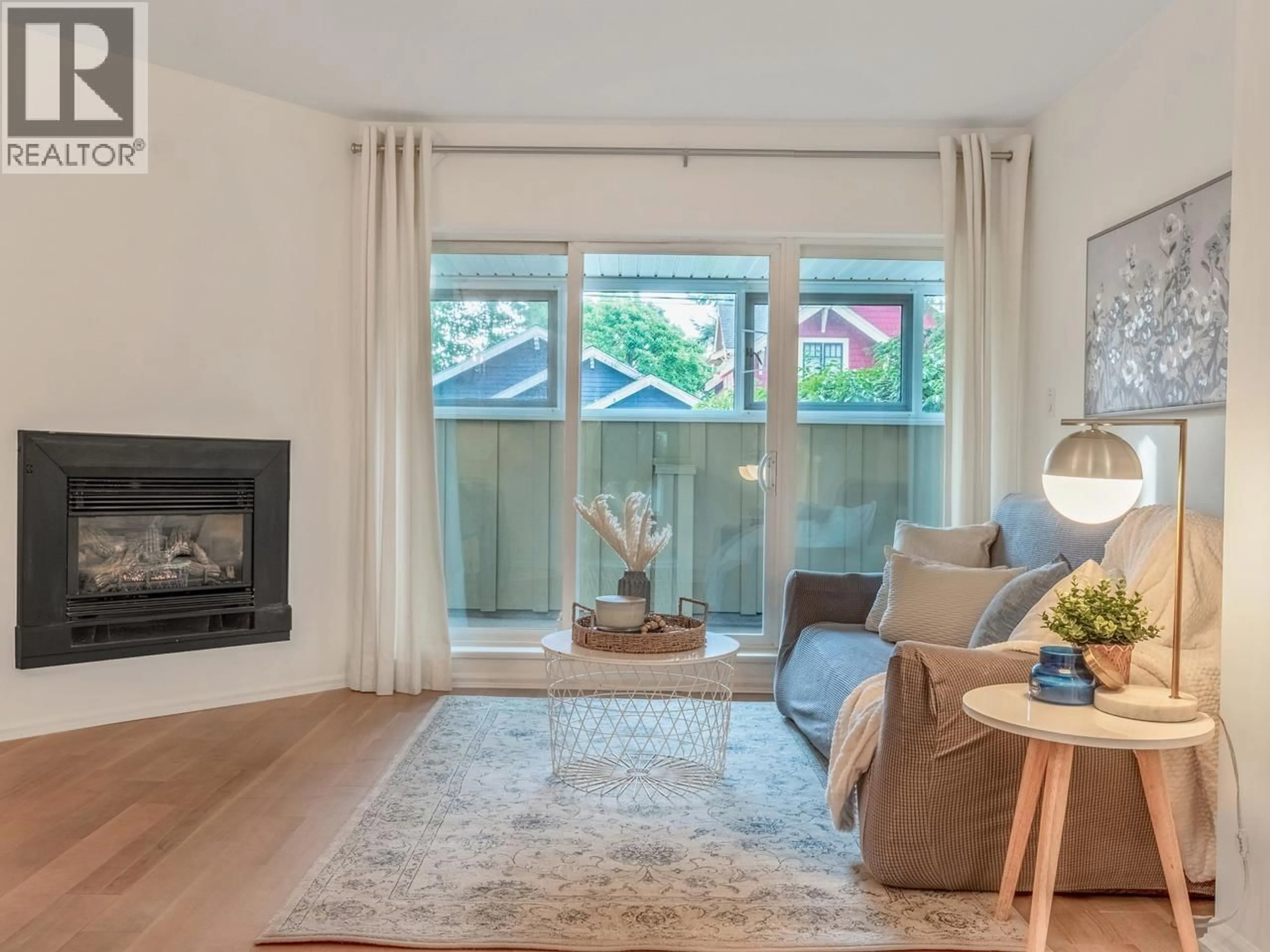 Living room with furniture, wood/laminate floor for 7 - 3250 4TH AVENUE, Vancouver British Columbia V6K1R9