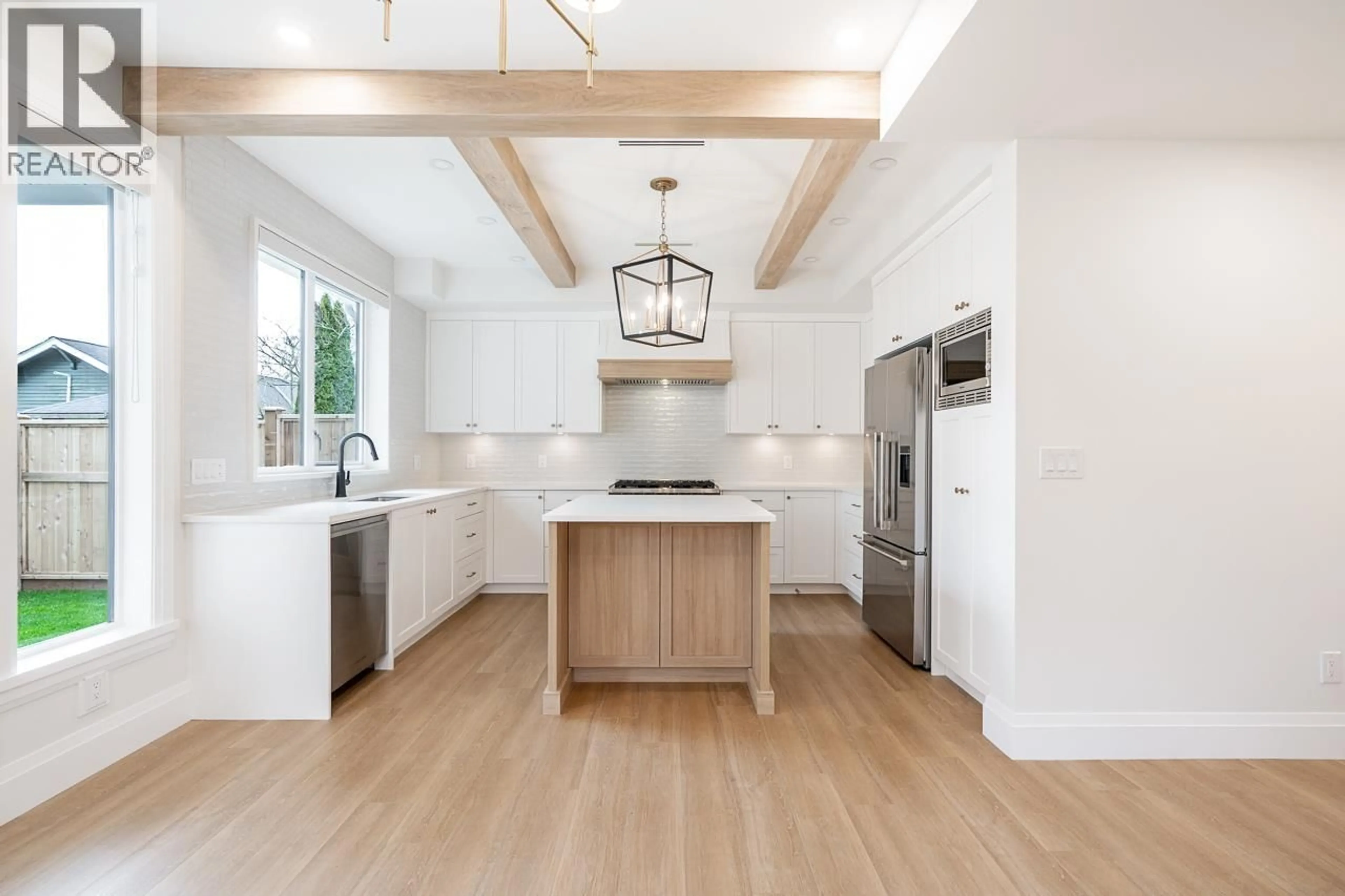 Open concept kitchen, wood/laminate floor for 5411 CRESCENT DRIVE, Delta British Columbia V4K2E3