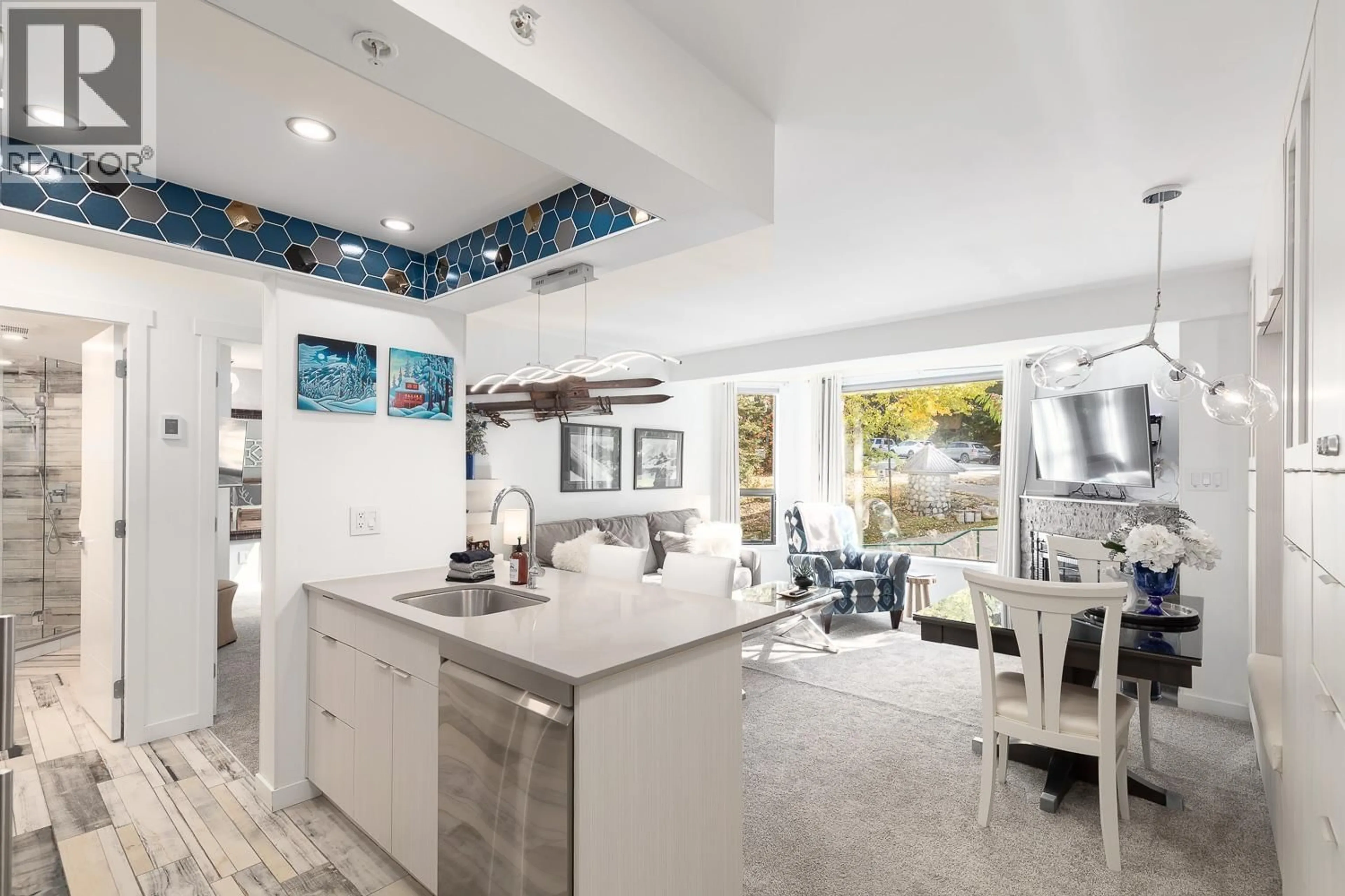 Open concept kitchen, ceramic/tile floor for 319 - 4809 SPEARHEAD DRIVE, Whistler British Columbia V8E1E8