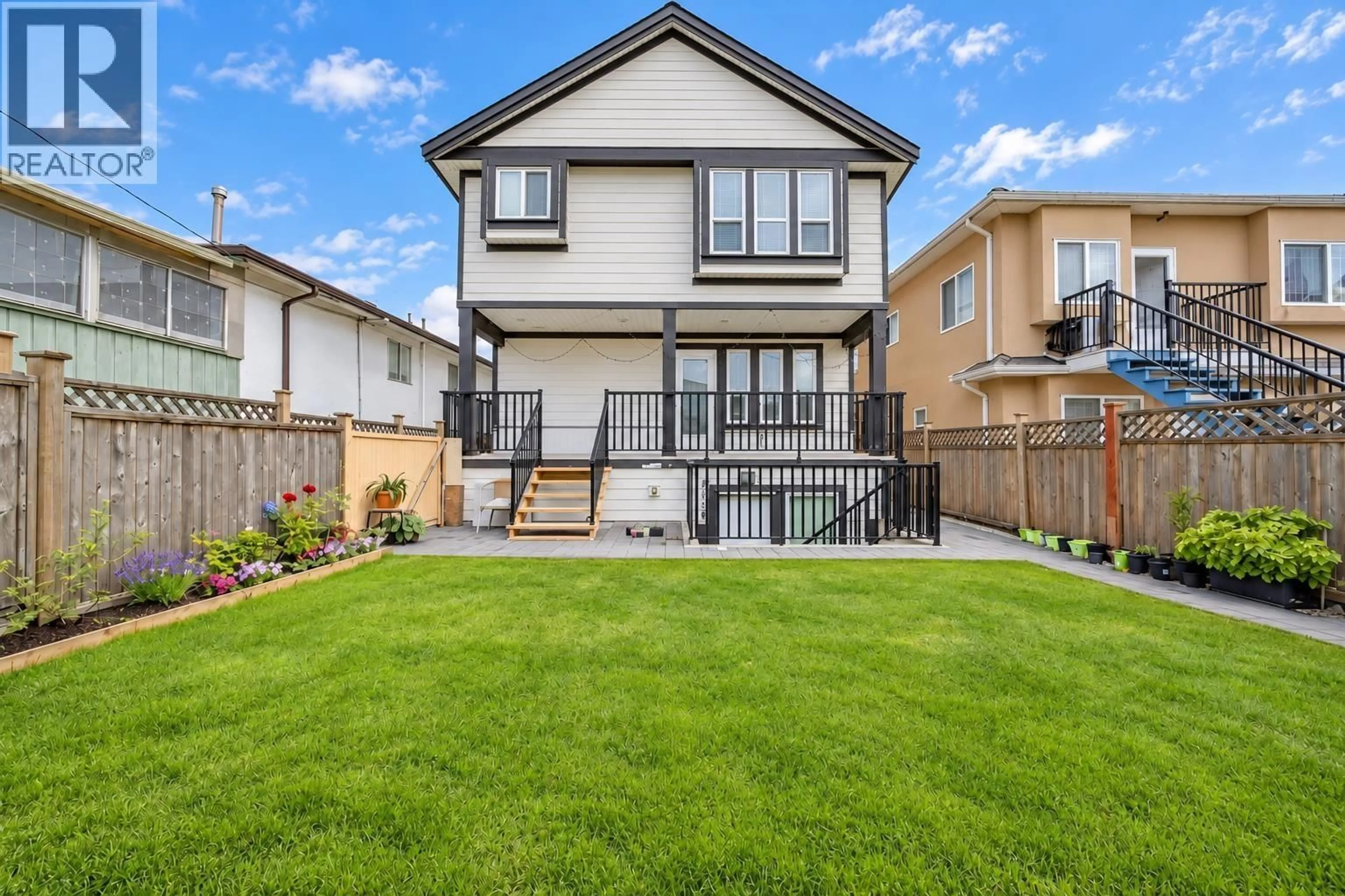 Home with vinyl exterior material, street for 2216 MANNERING AVENUE, Vancouver British Columbia V5N3C4