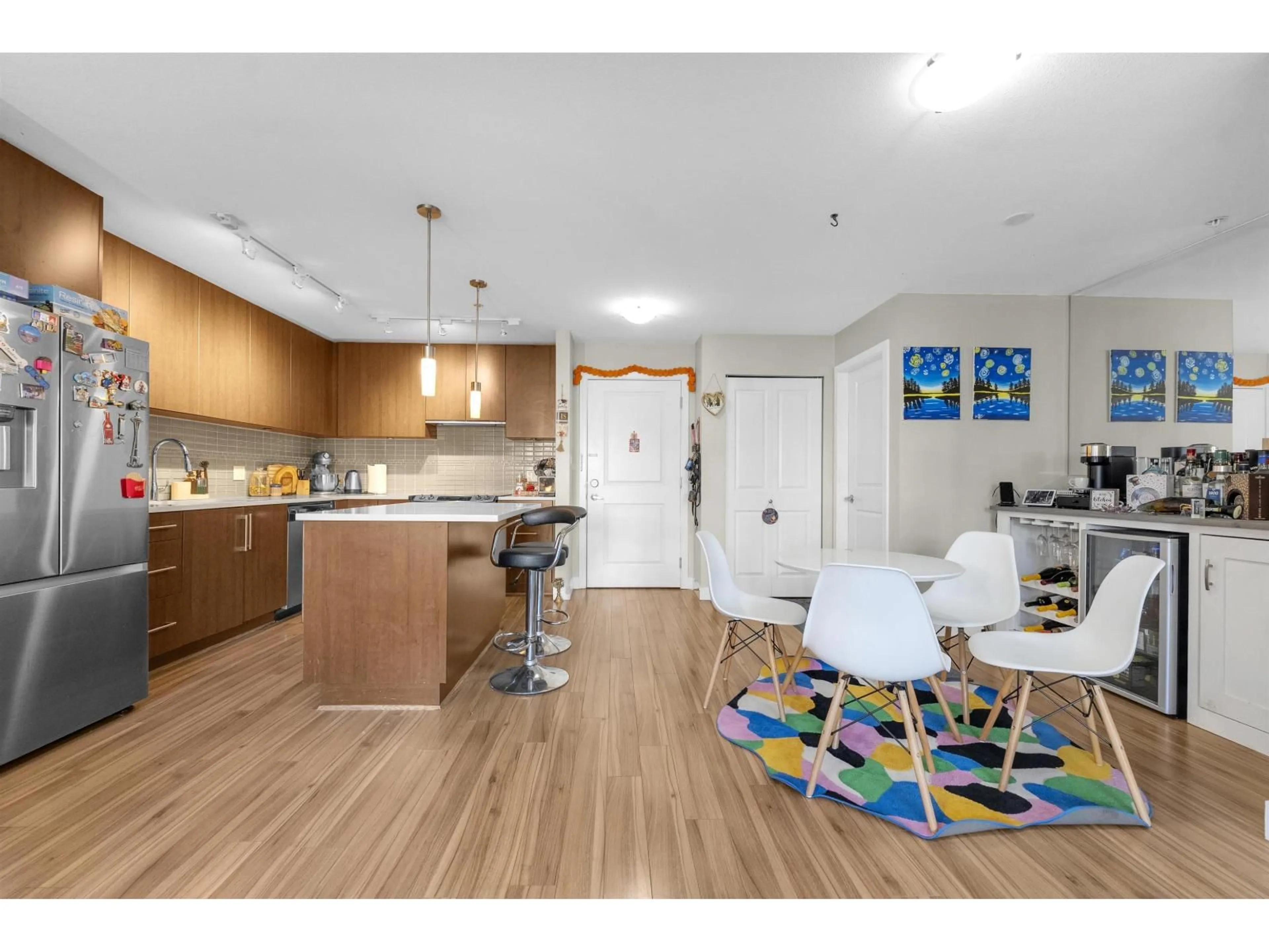 Open concept kitchen, wood/laminate floor for 353 - 15850 26 AVENUE, Surrey British Columbia V3Z2N6