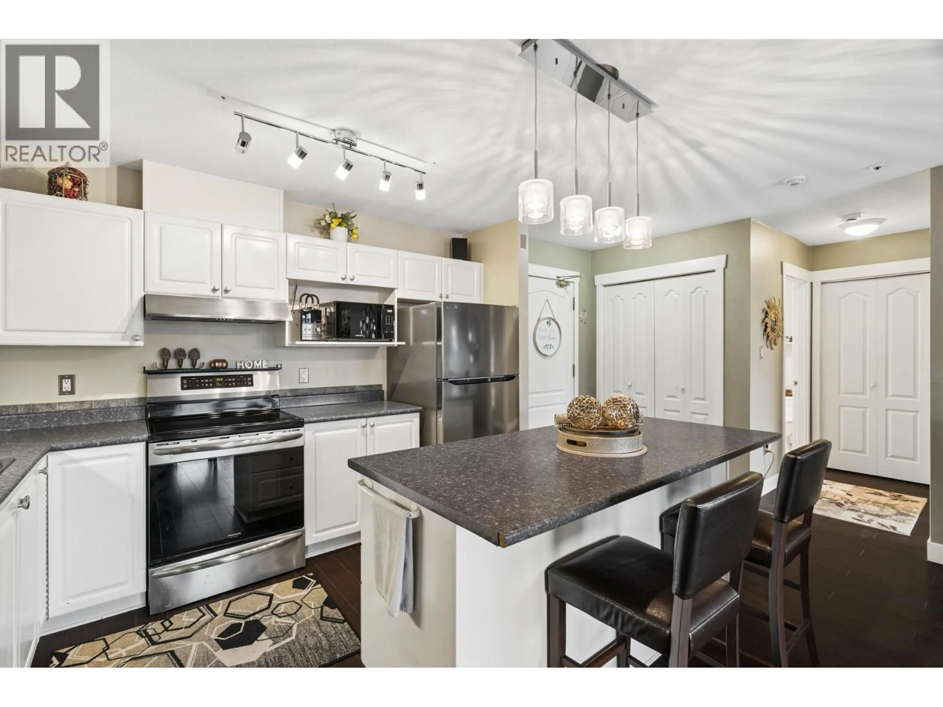 Open concept kitchen, unknown for 414 - 2968 BURLINGTON DRIVE, Coquitlam British Columbia V3B7N4