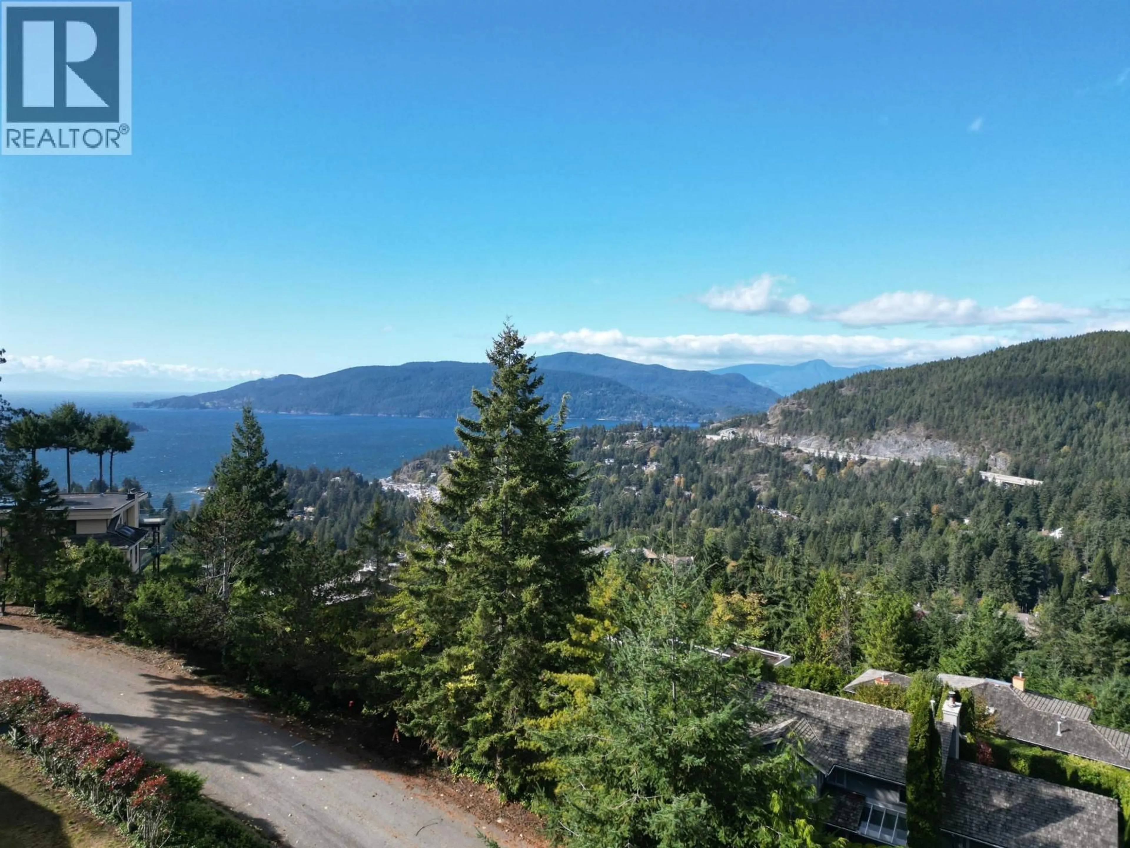 A pic from outside/outdoor area/front of a property/back of a property/a pic from drone, mountain view for 4764 WOODBURN ROAD, West Vancouver British Columbia V7S3B2