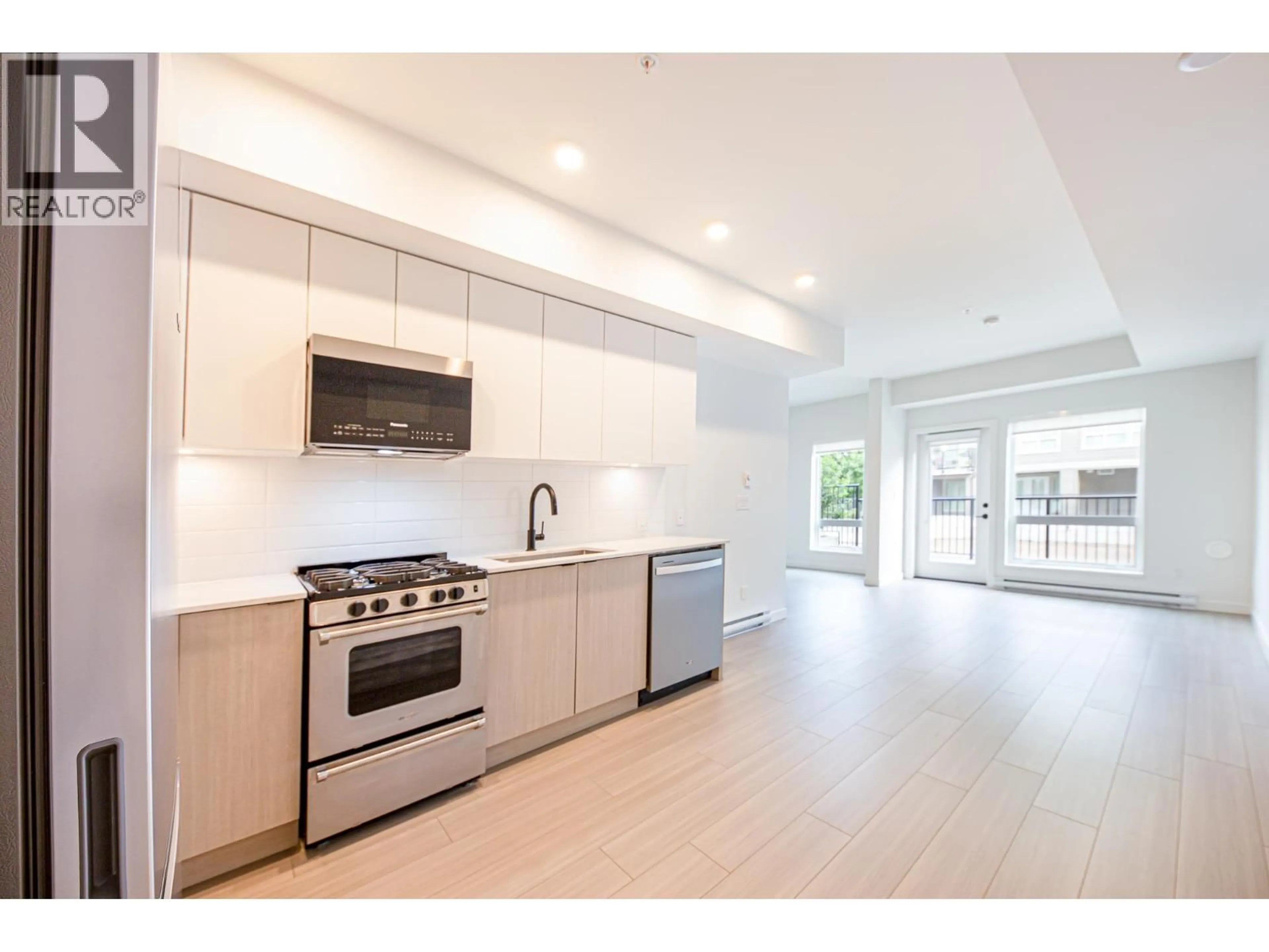 Open concept kitchen, unknown for 102 - 2277 HAWTHORNE AVENUE, Port Coquitlam British Columbia V3C1W7