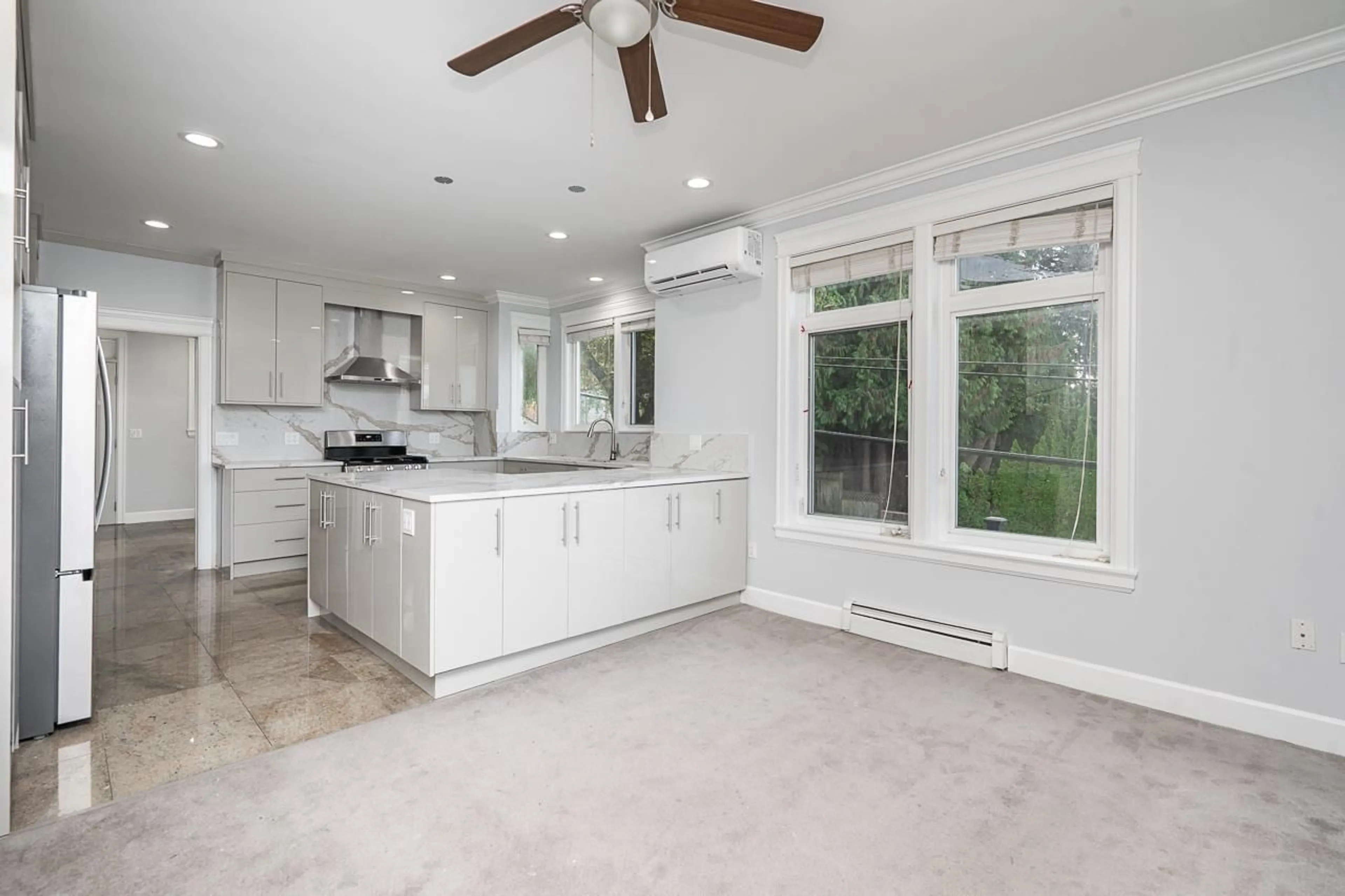 Open concept kitchen, ceramic/tile floor for 10302 MAIN STREET, Delta British Columbia V4C2P4