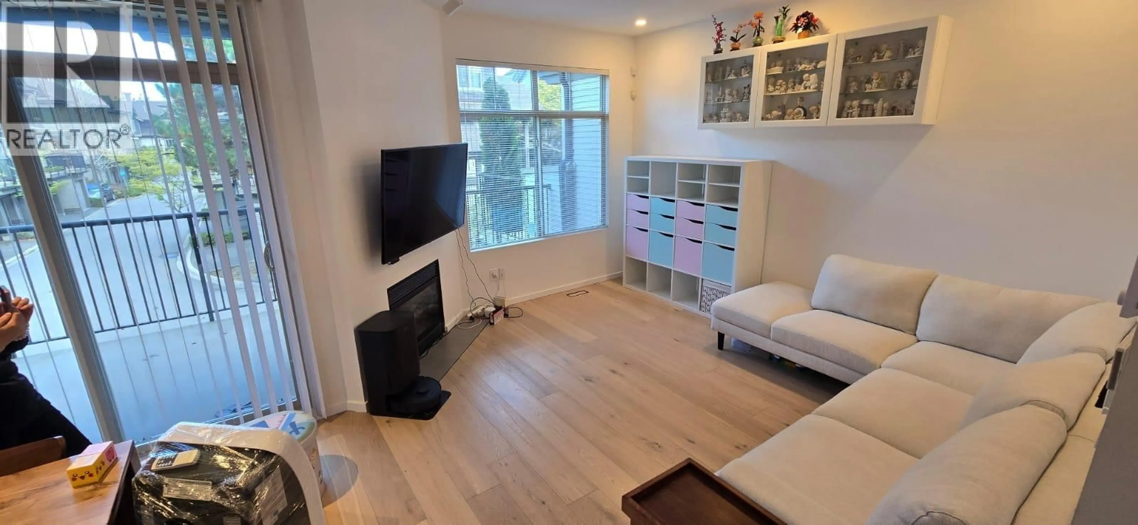 Living room with furniture, wood/laminate floor for 37 - 6233 BIRCH STREET, Richmond British Columbia V6Y4H3