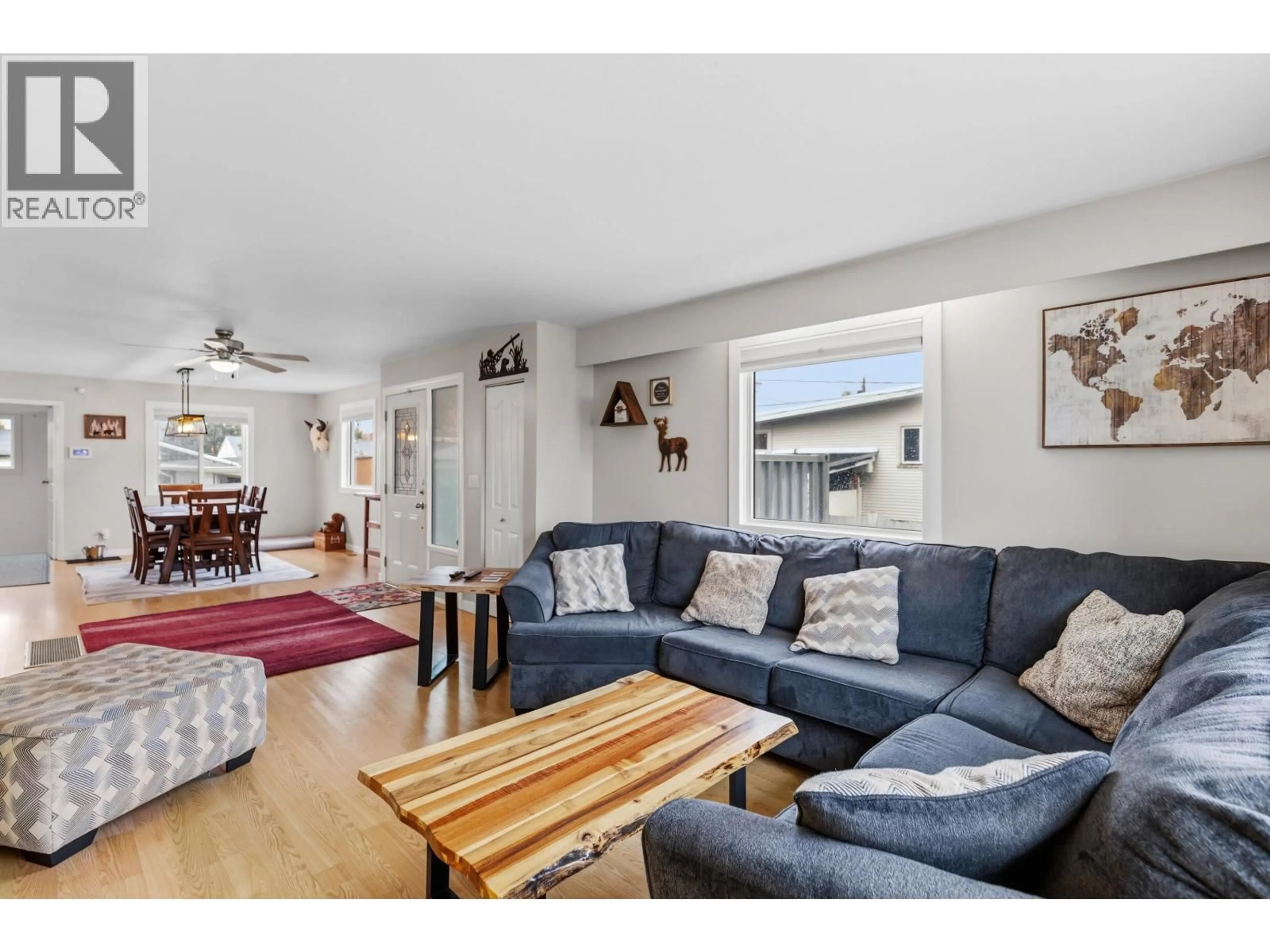 Living room with furniture, wood/laminate floor for 905 HARPER STREET, Prince George British Columbia V2M2W8