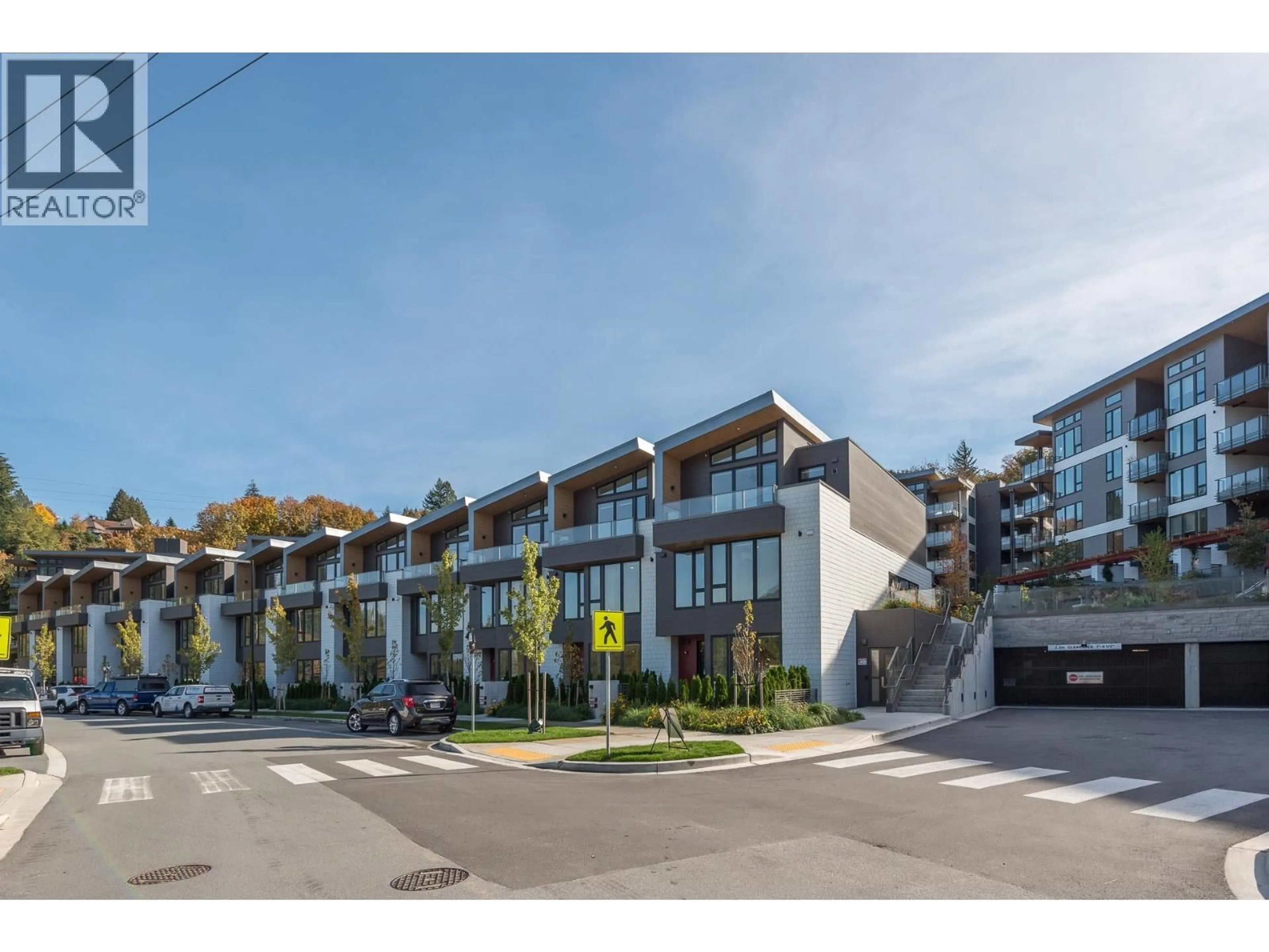 A pic from outside/outdoor area/front of a property/back of a property/a pic from drone, street for 101 - 1502 SCOTT CRESCENT, Squamish British Columbia V8B1G4