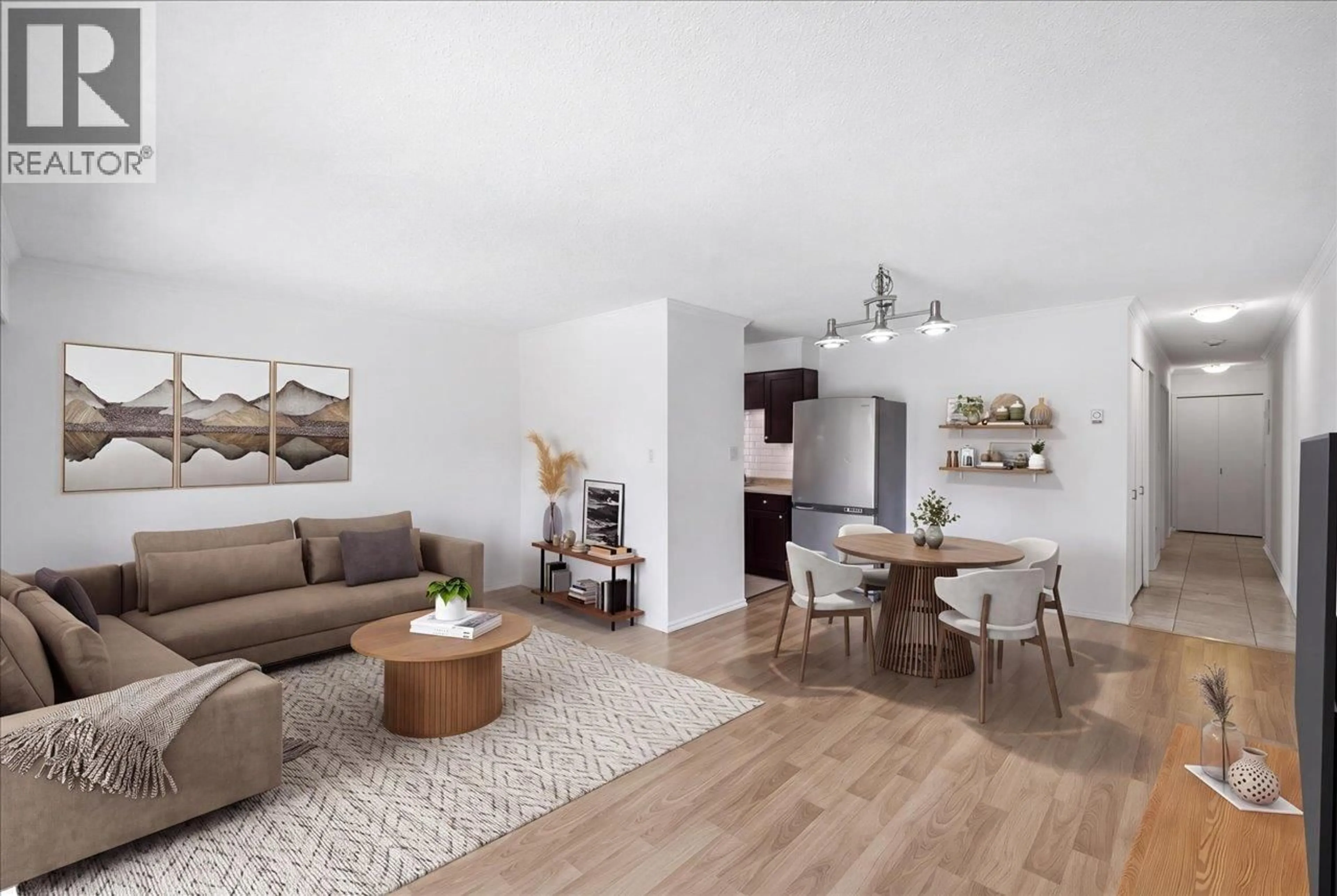 Living room with furniture, wood/laminate floor for 202 - 212 FORBES AVENUE, North Vancouver British Columbia V7M3E5