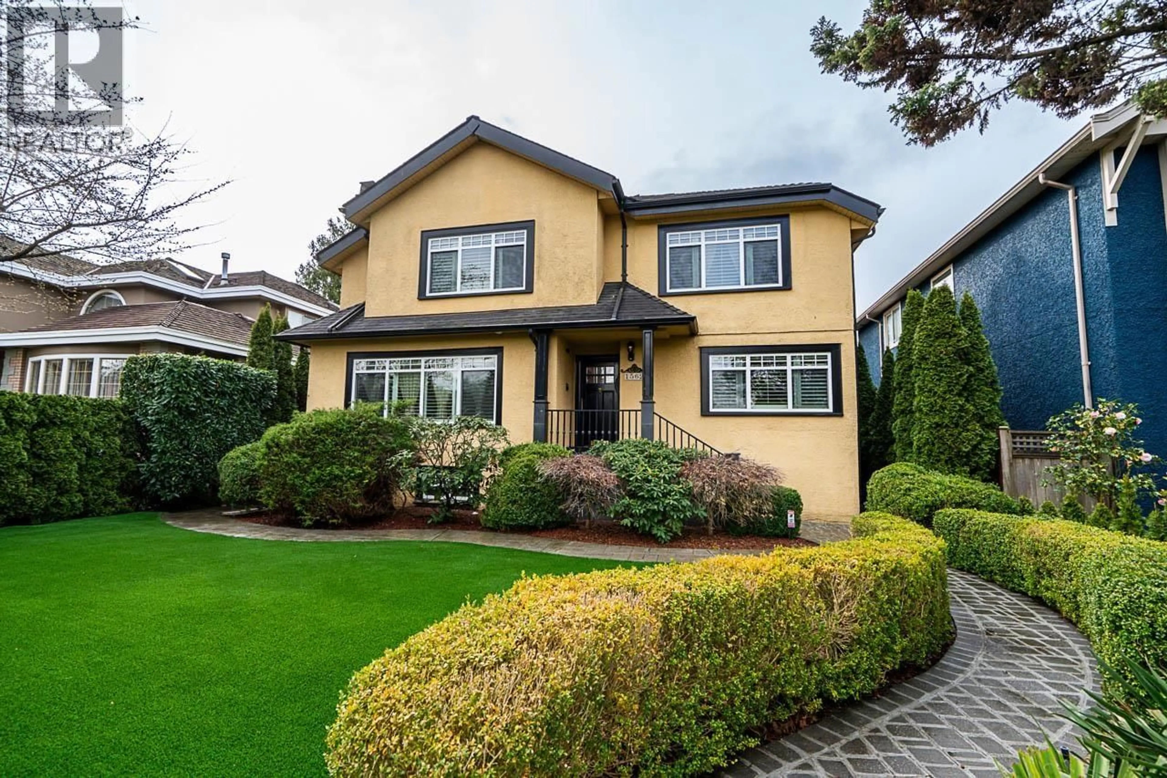 Home with vinyl exterior material, street for 1562 62ND AVENUE, Vancouver British Columbia V6P2E9