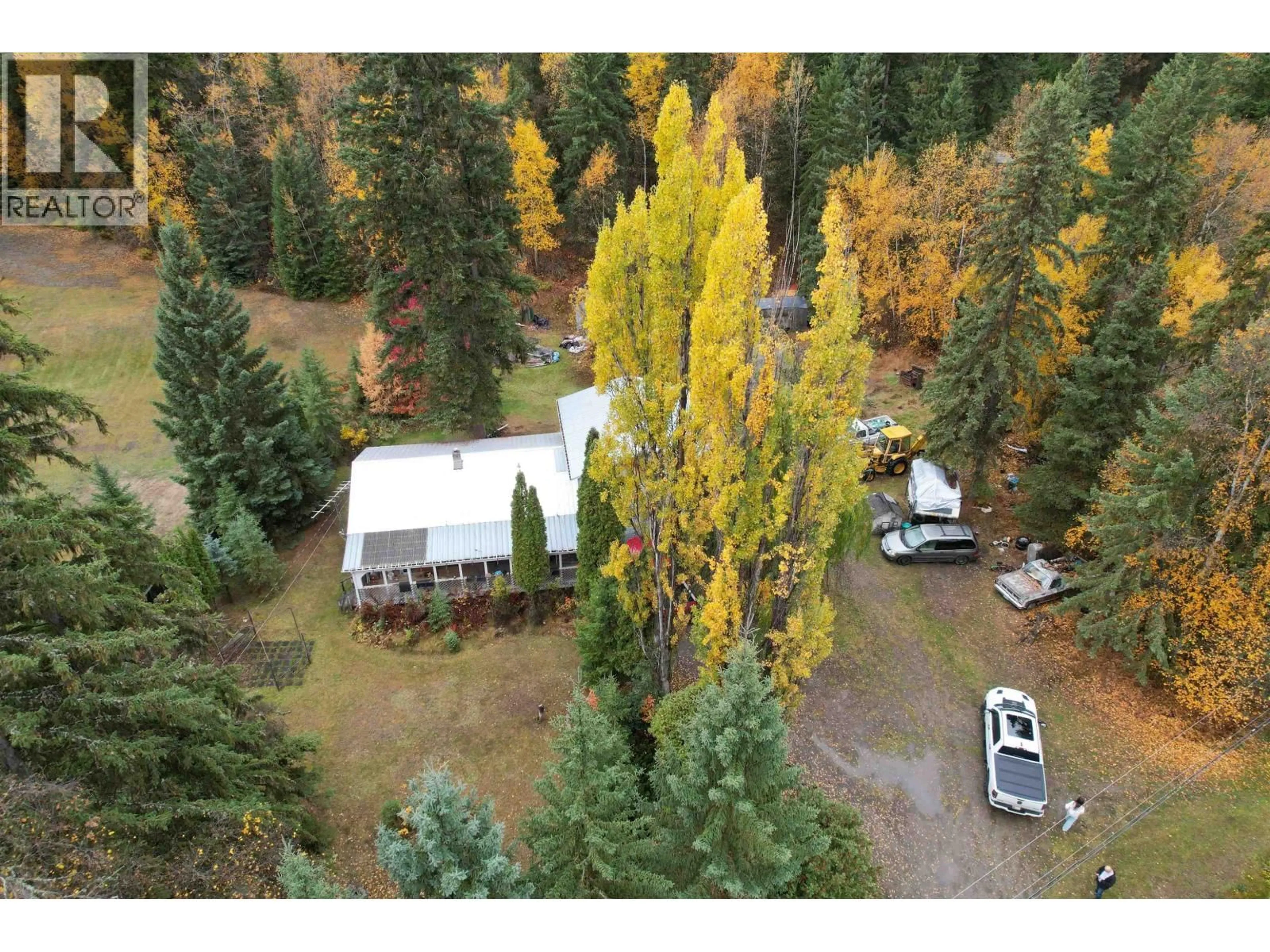 A pic from outside/outdoor area/front of a property/back of a property/a pic from drone, forest/trees view for 2064 WEST FRASER ROAD, Quesnel British Columbia V2J6J7