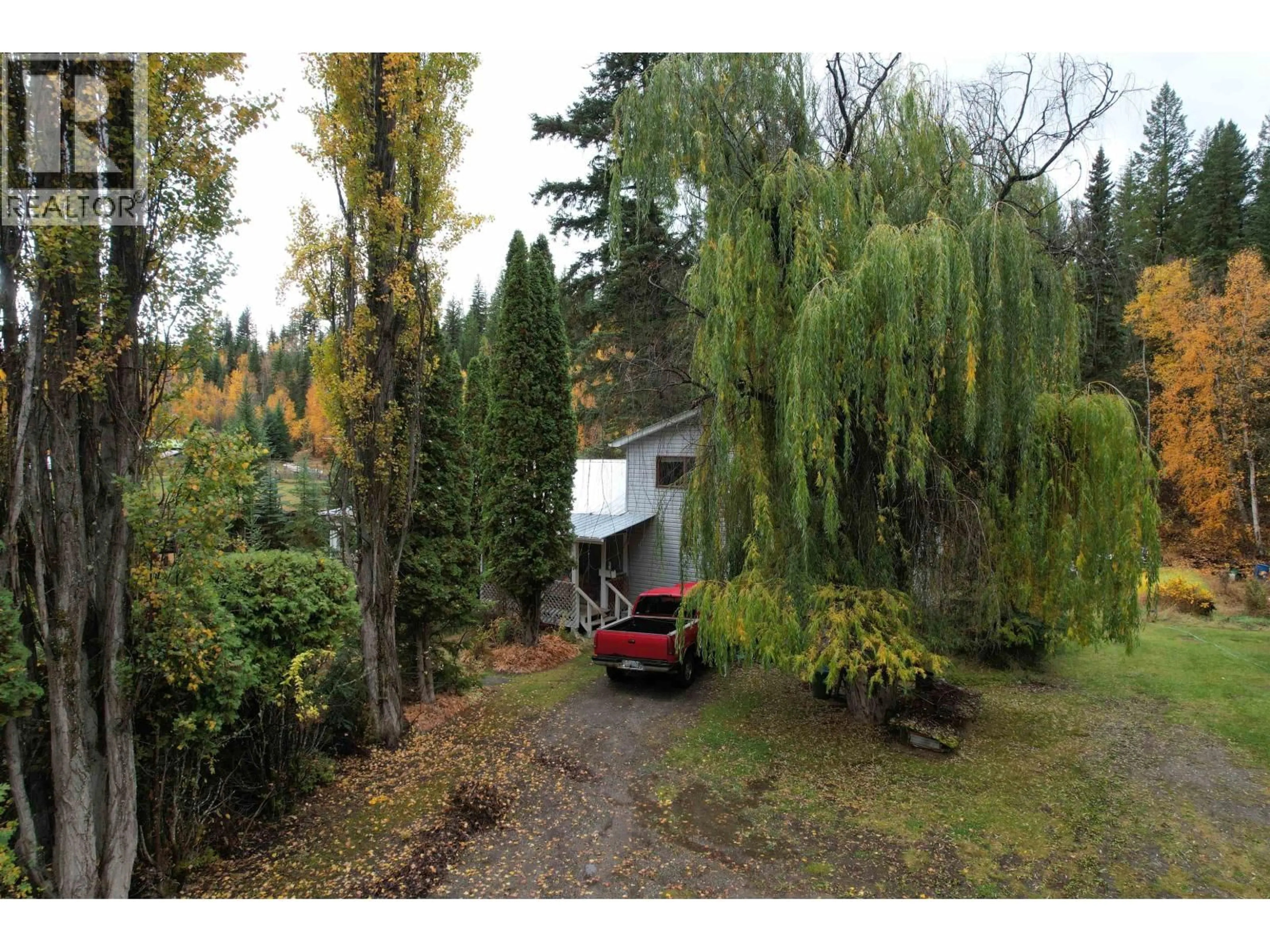 A pic from outside/outdoor area/front of a property/back of a property/a pic from drone, forest/trees view for 2064 WEST FRASER ROAD, Quesnel British Columbia V2J6J7