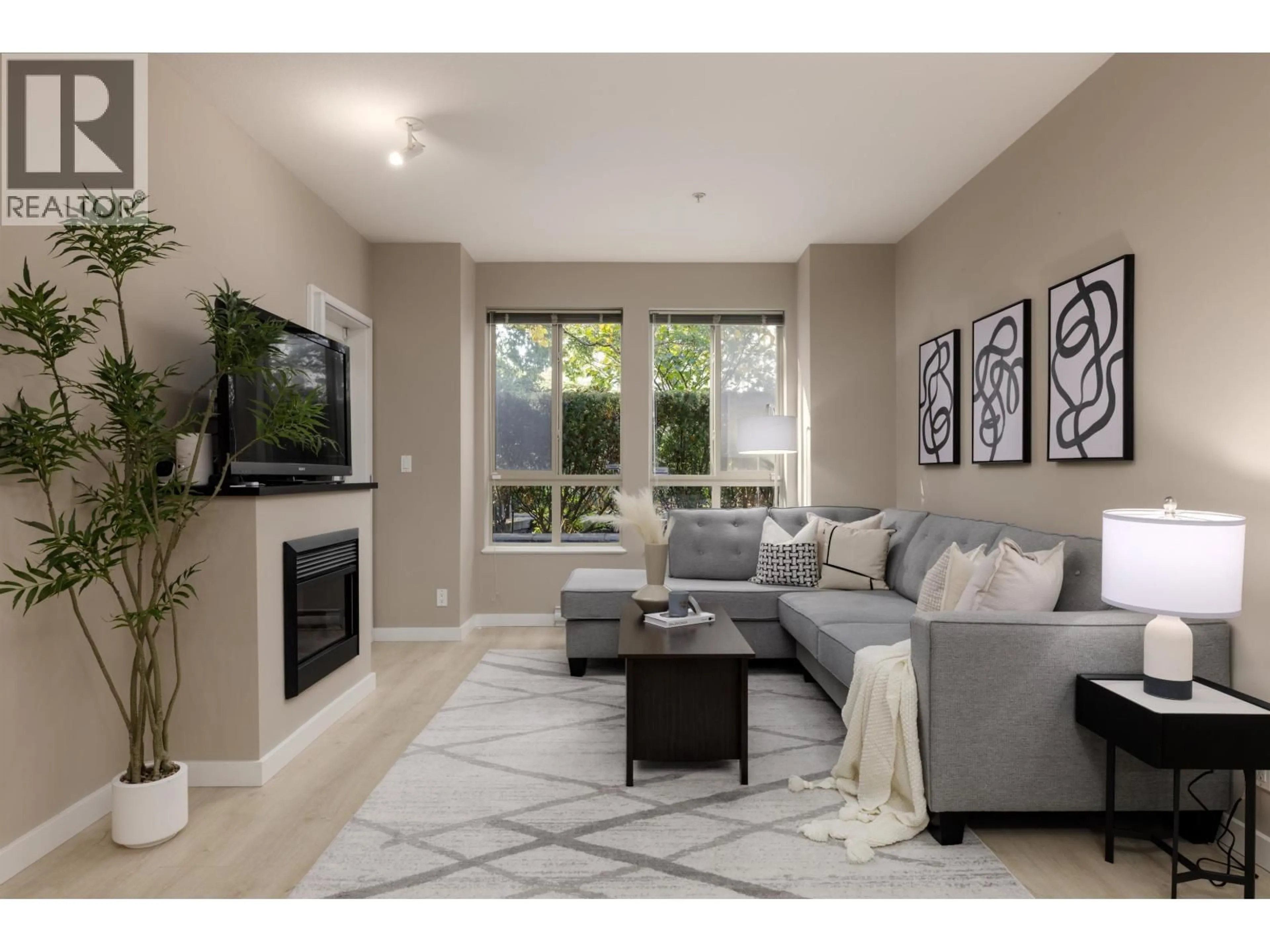 Living room with furniture, unknown for 105 - 225 FRANCIS WAY, New Westminster British Columbia V3L0G1