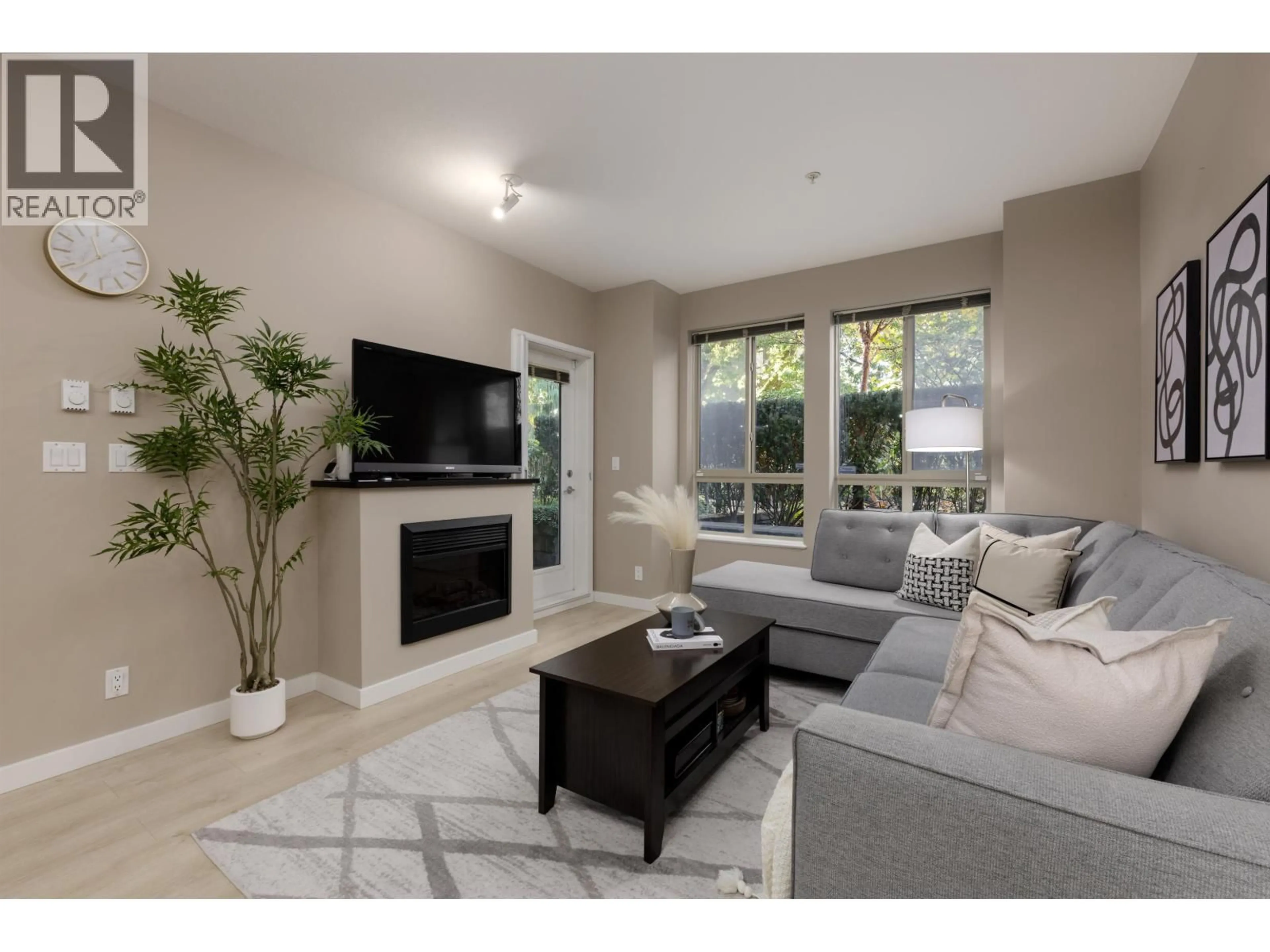 Living room with furniture, unknown for 105 - 225 FRANCIS WAY, New Westminster British Columbia V3L0G1
