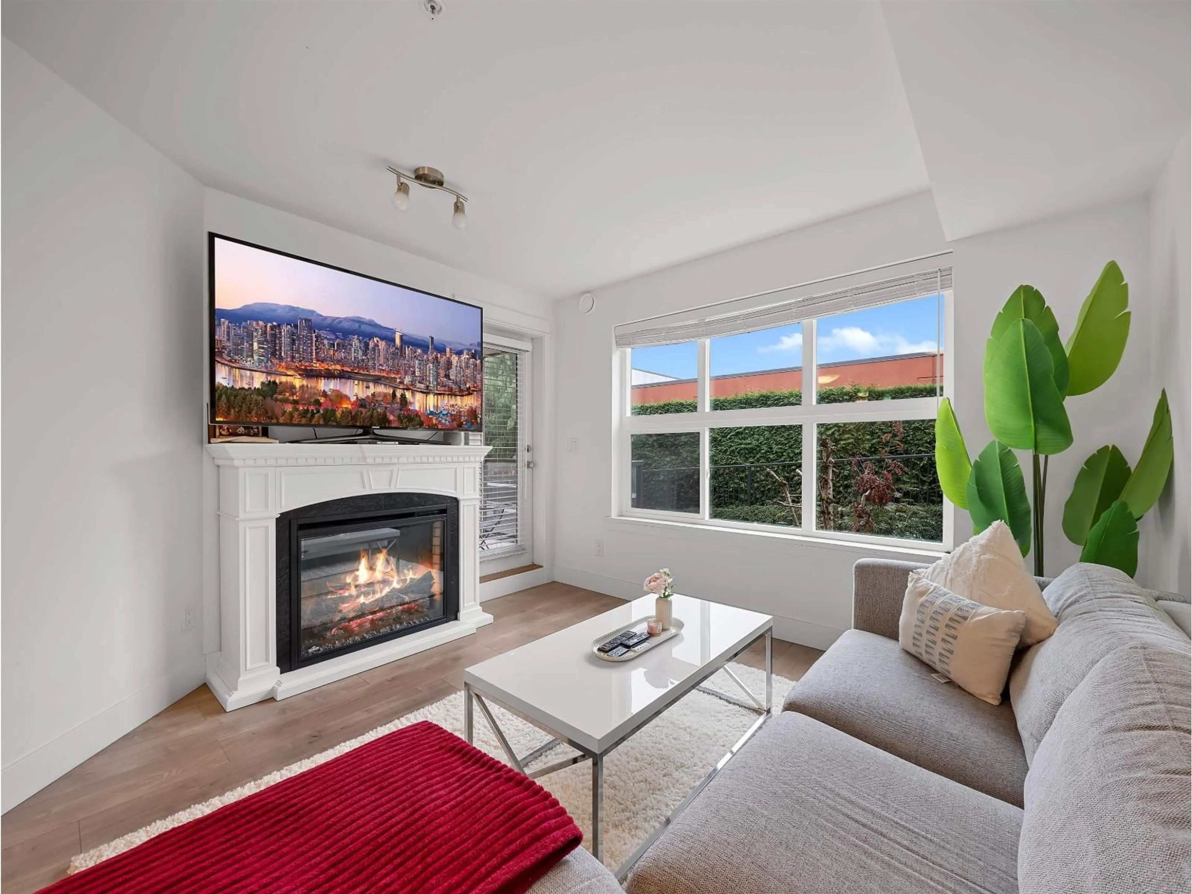 Living room with furniture, wood/laminate floor for 213 - 30515 CARDINAL AVENUE, Abbotsford British Columbia V2T0A8