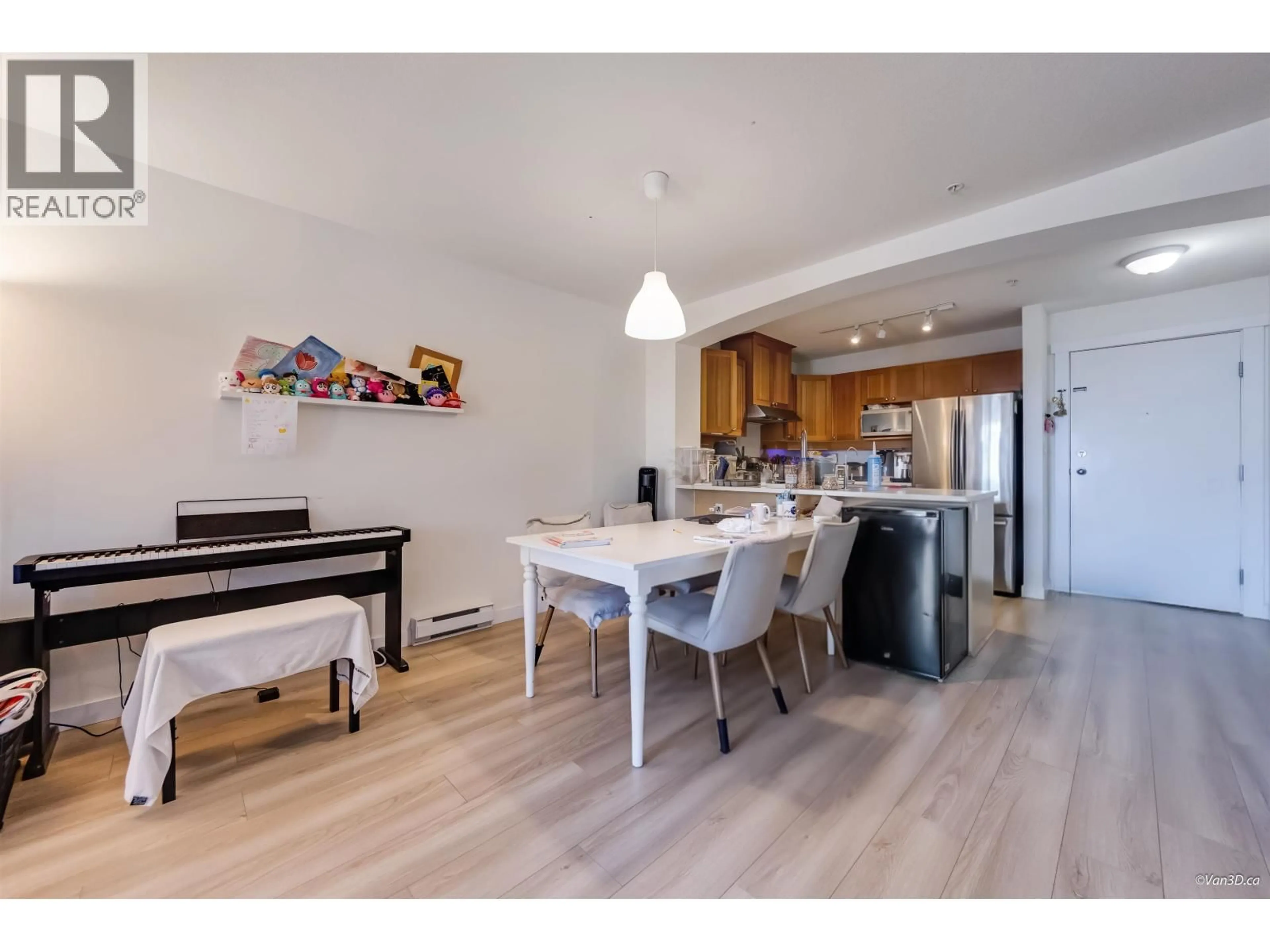 Open concept kitchen, wood/laminate floor for 208 - 1420 PARKWAY BOULEVARD, Coquitlam British Columbia V3E3J6