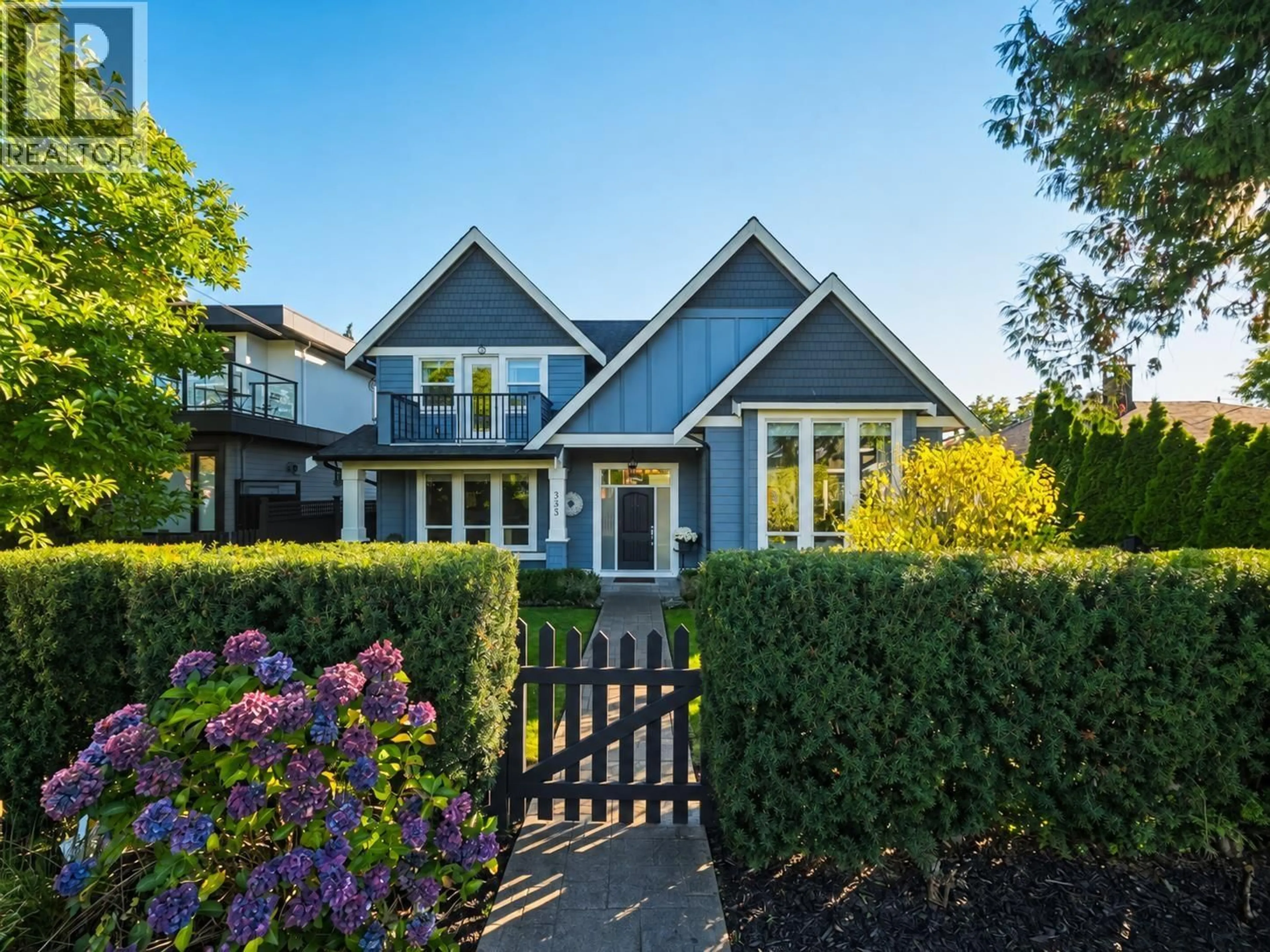 Home with vinyl exterior material, street for 355 15TH STREET, North Vancouver British Columbia V7L2R6