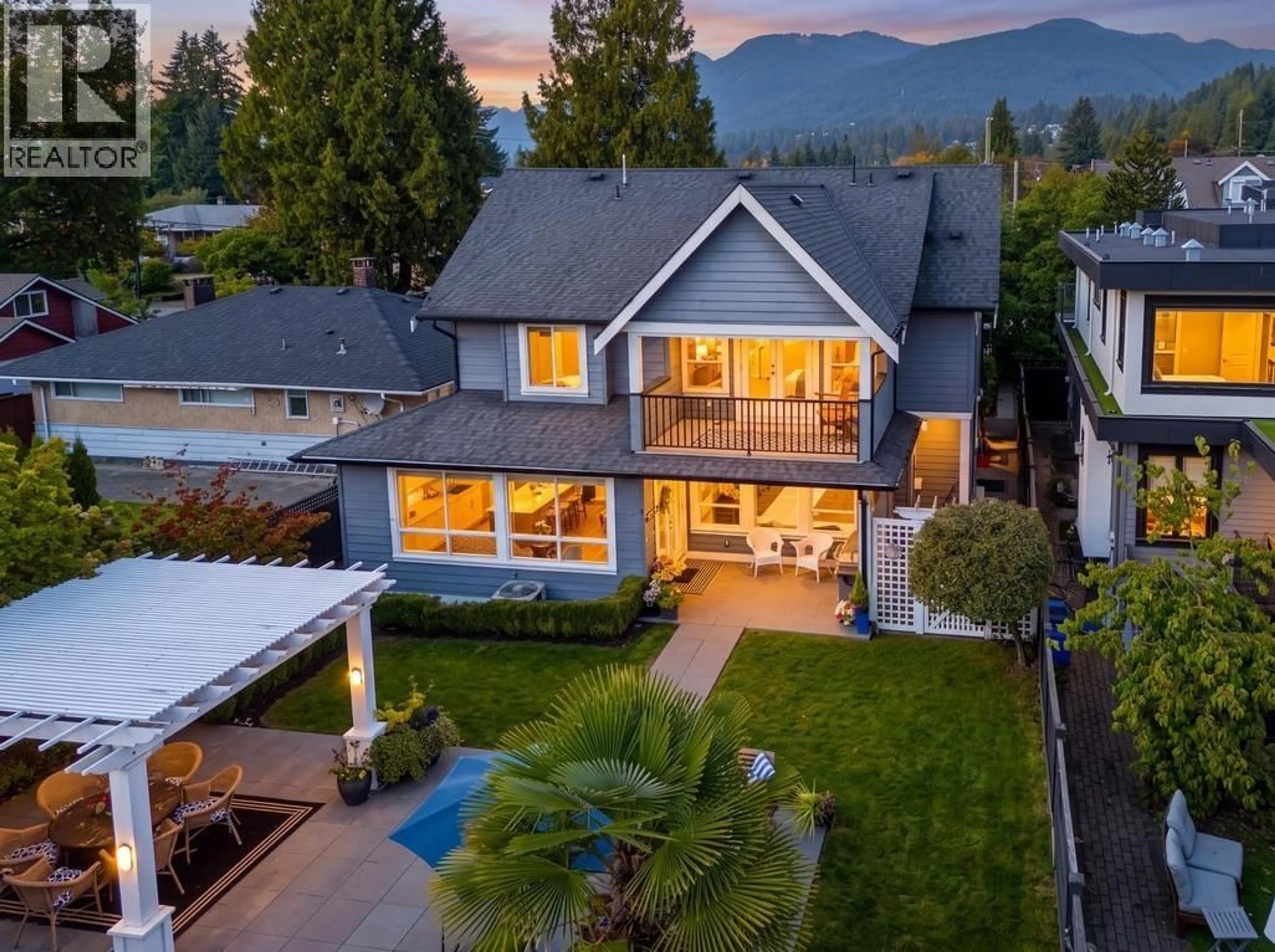 A pic from outside/outdoor area/front of a property/back of a property/a pic from drone, mountain view for 355 15TH STREET, North Vancouver British Columbia V7L2R6