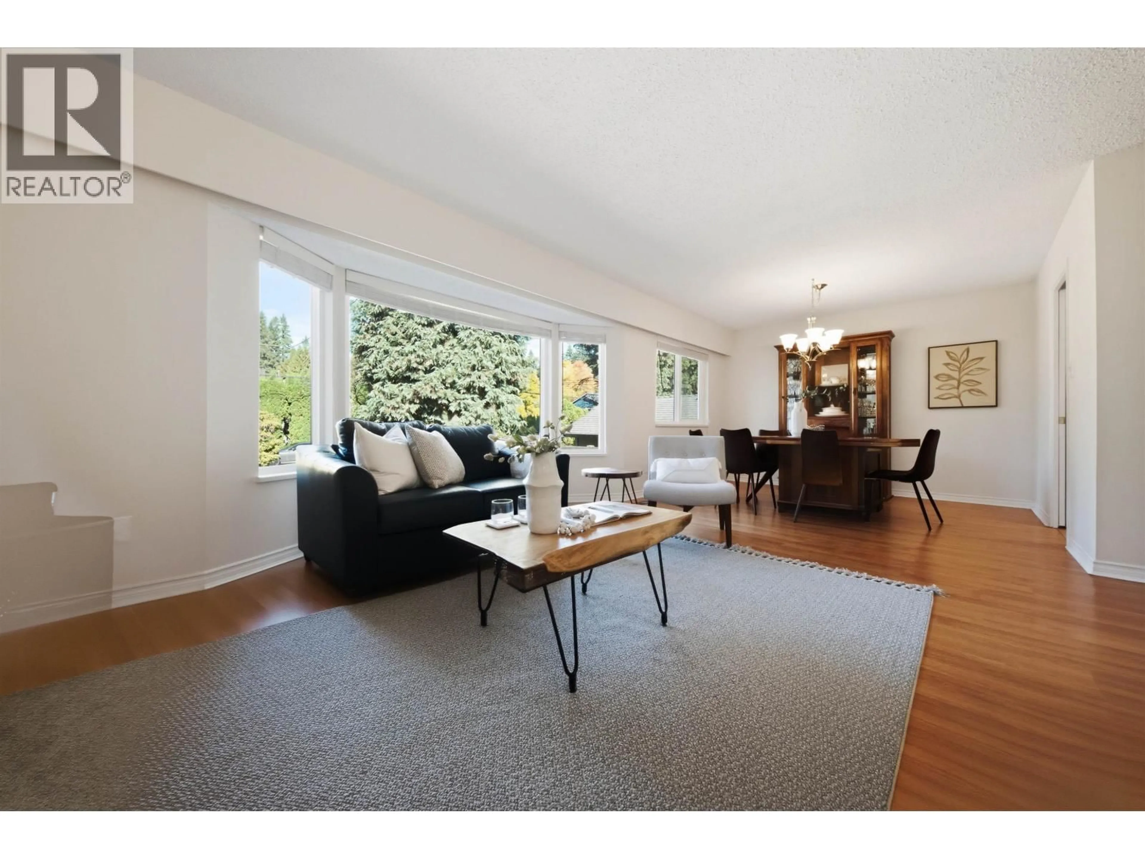 Living room with furniture, wood/laminate floor for 1825 PETERS ROAD, North Vancouver British Columbia V7Y1Y7