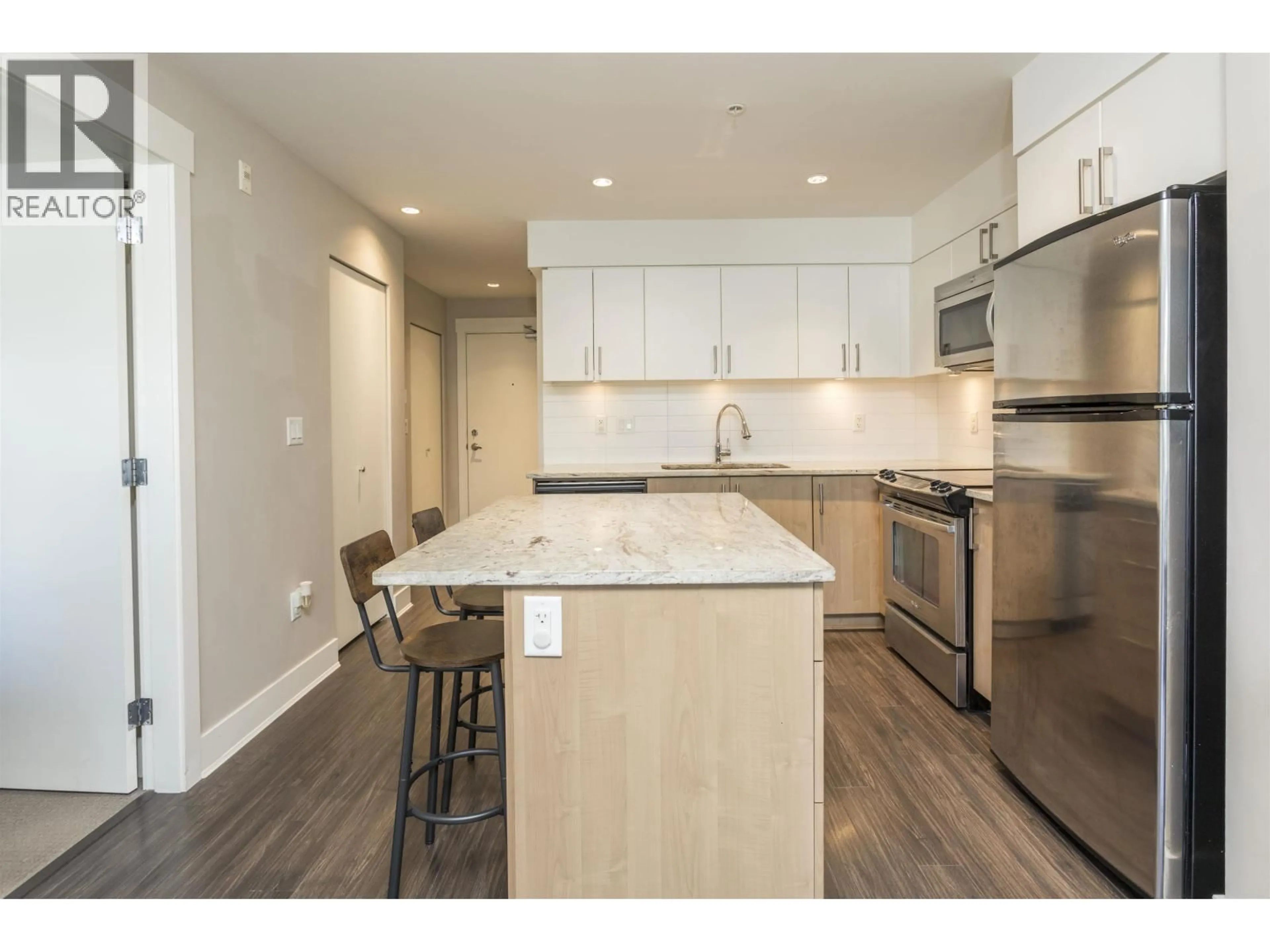 Open concept kitchen, wood/laminate floor for 308 - 55 EIGHTH AVENUE, New Westminster British Columbia V3L0E8