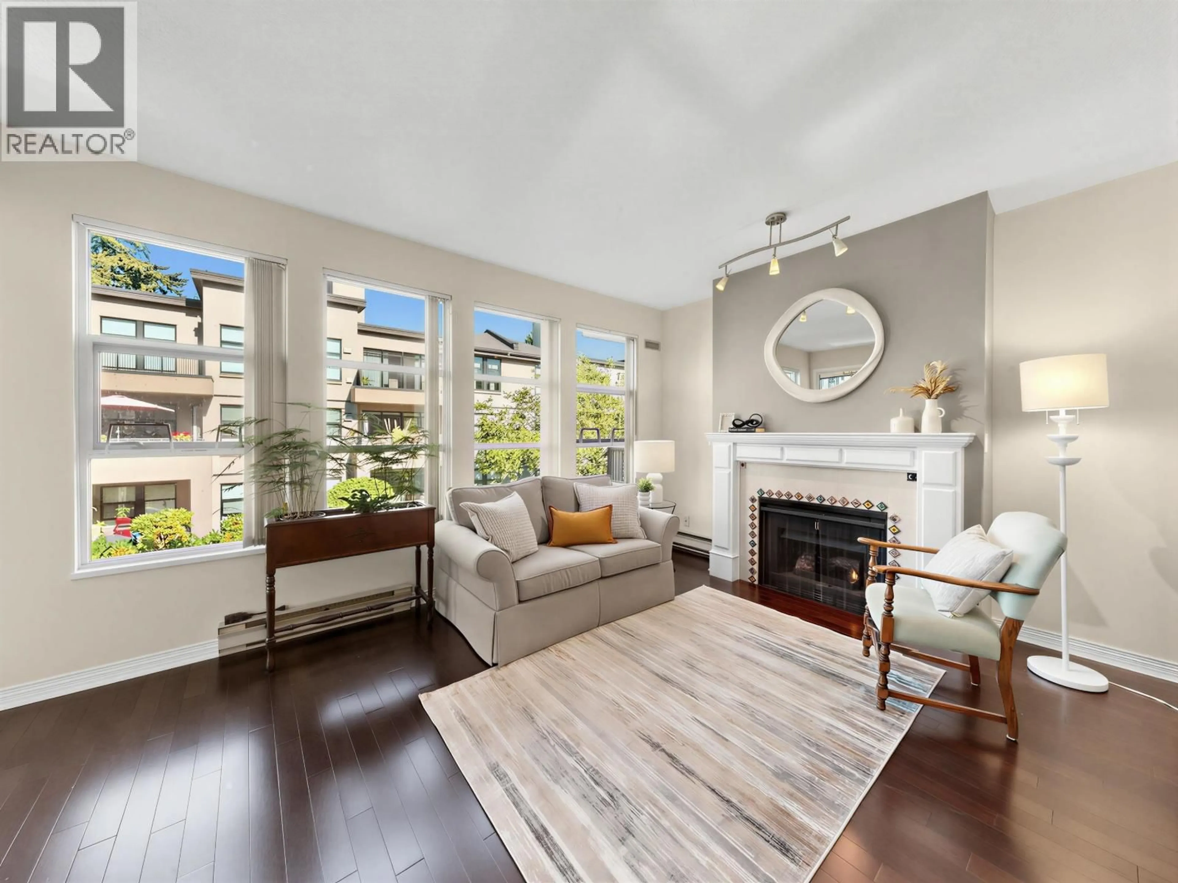 Living room with furniture, unknown for 221 - 3769 7TH AVENUE, Vancouver British Columbia V6R1W6
