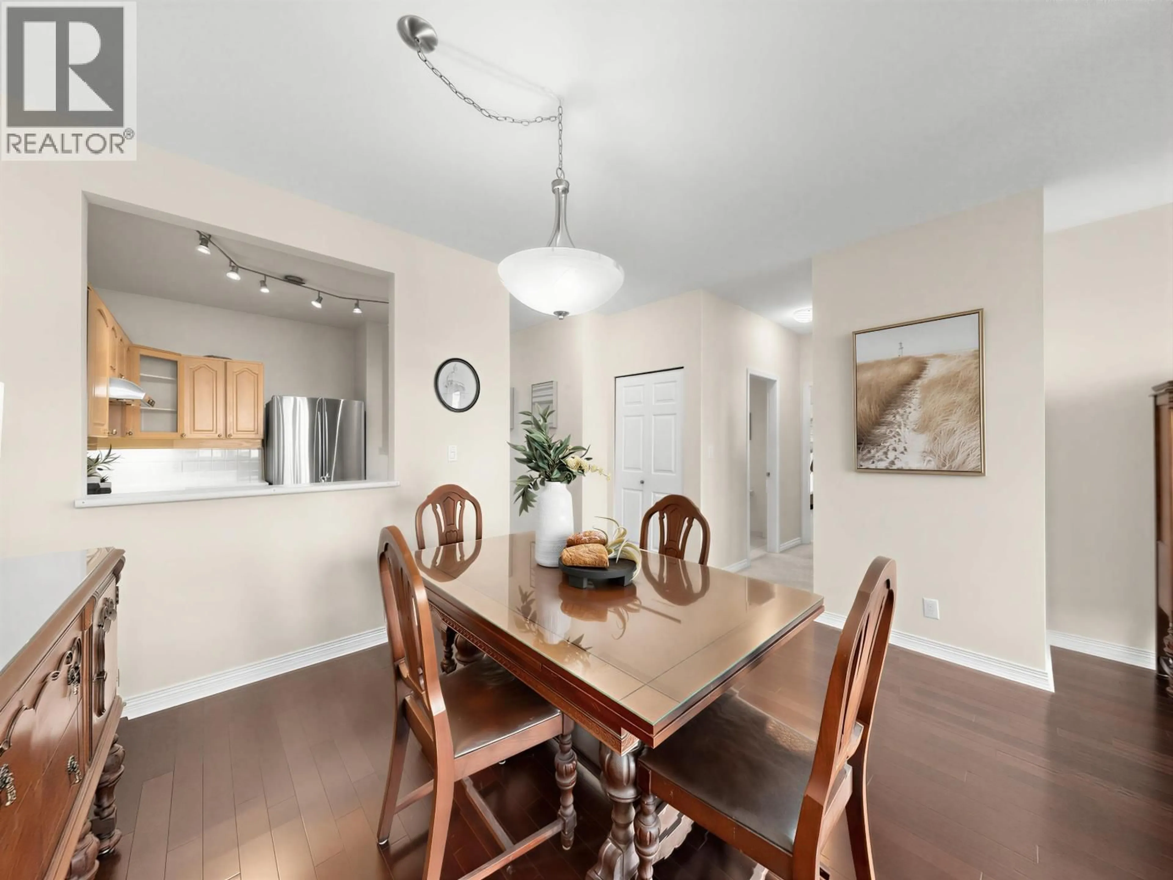 Dining room, wood/laminate floor for 221 - 3769 7TH AVENUE, Vancouver British Columbia V6R1W6