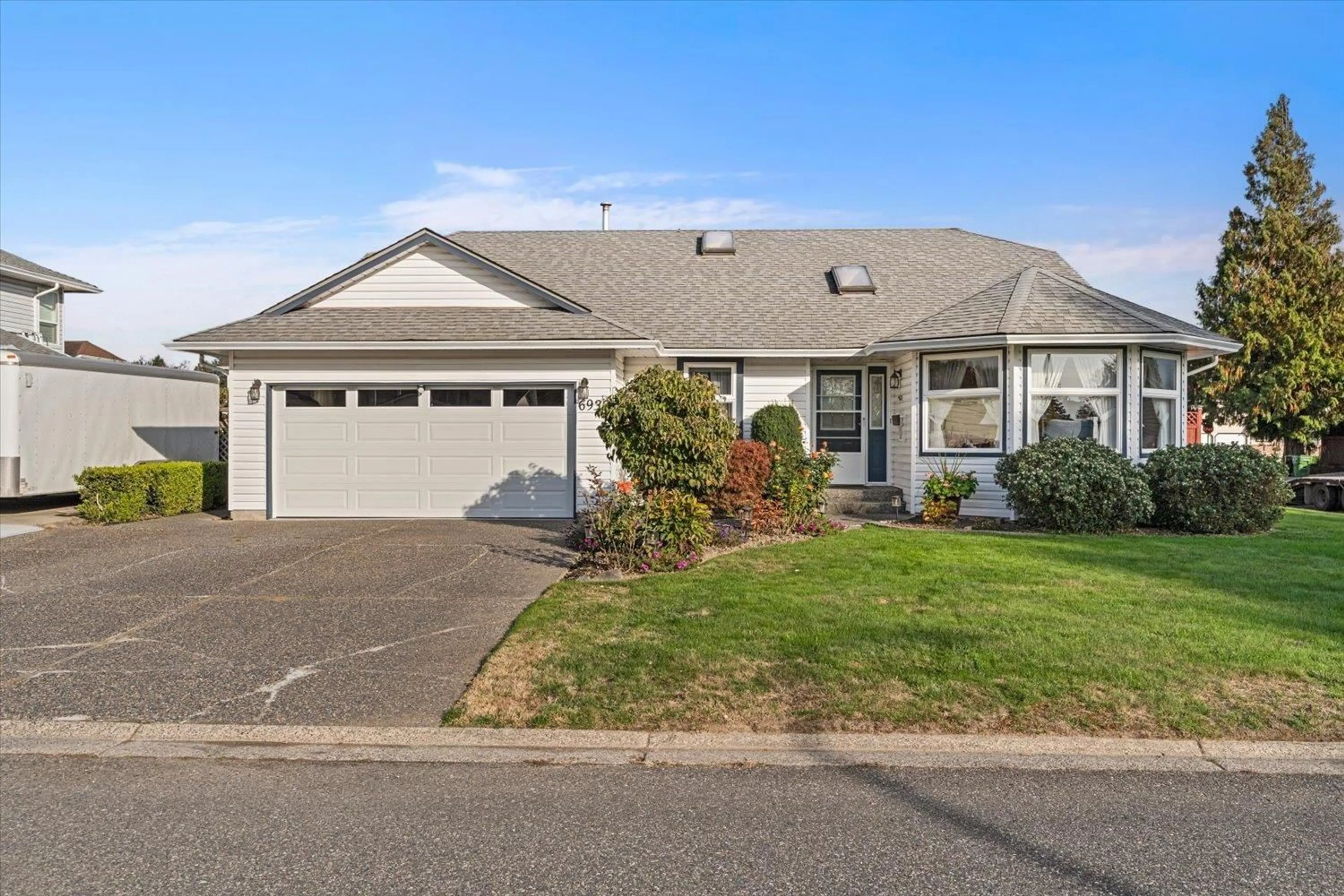 Home with vinyl exterior material, street for 6930 COACH LAMP DRIVE, Chilliwack British Columbia V2R2V4