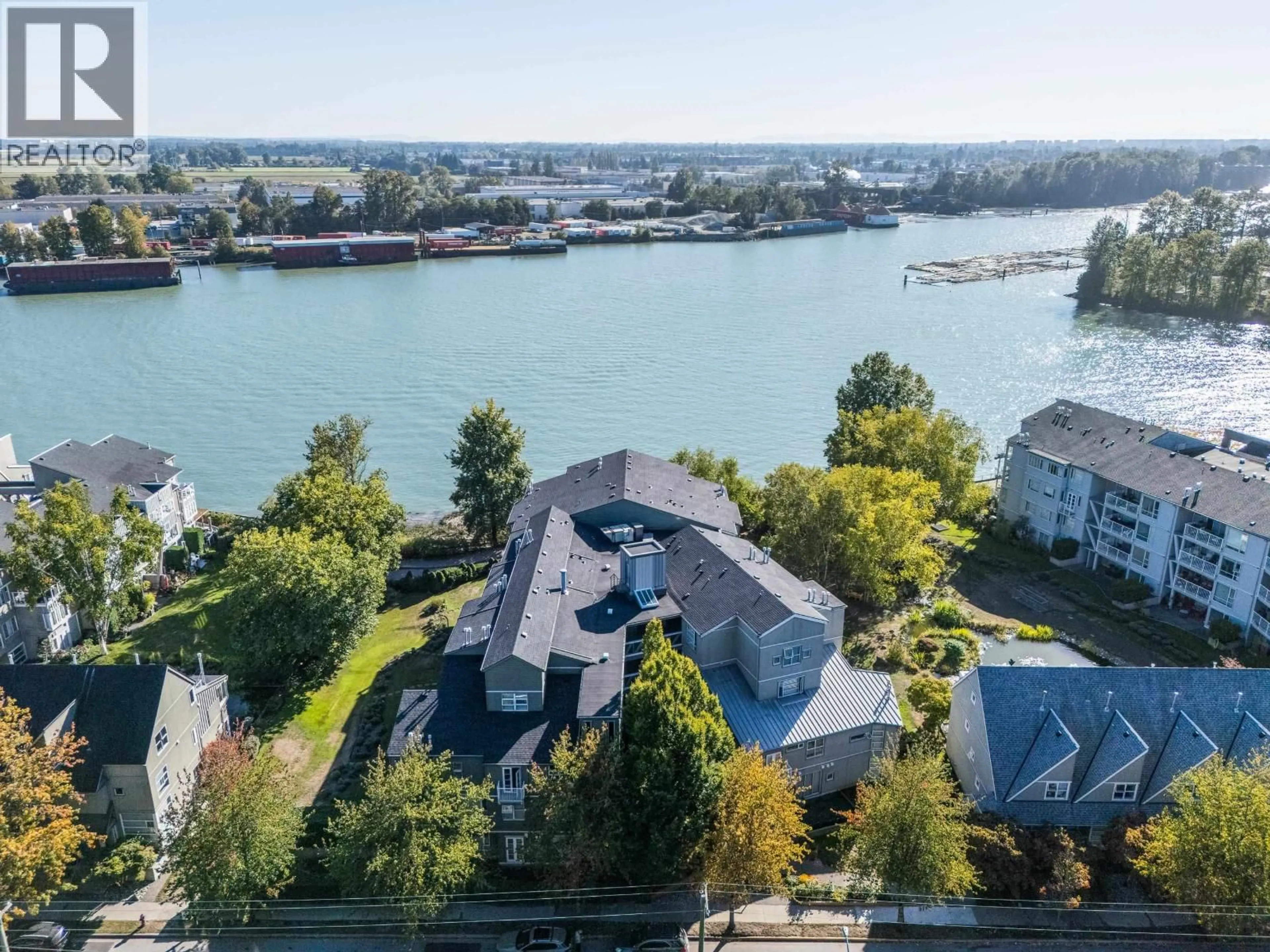 A pic from outside/outdoor area/front of a property/back of a property/a pic from drone, water/lake/river/ocean view for 303 - 2080 KENT AVENUE SOUTH, Vancouver British Columbia V5P4X2