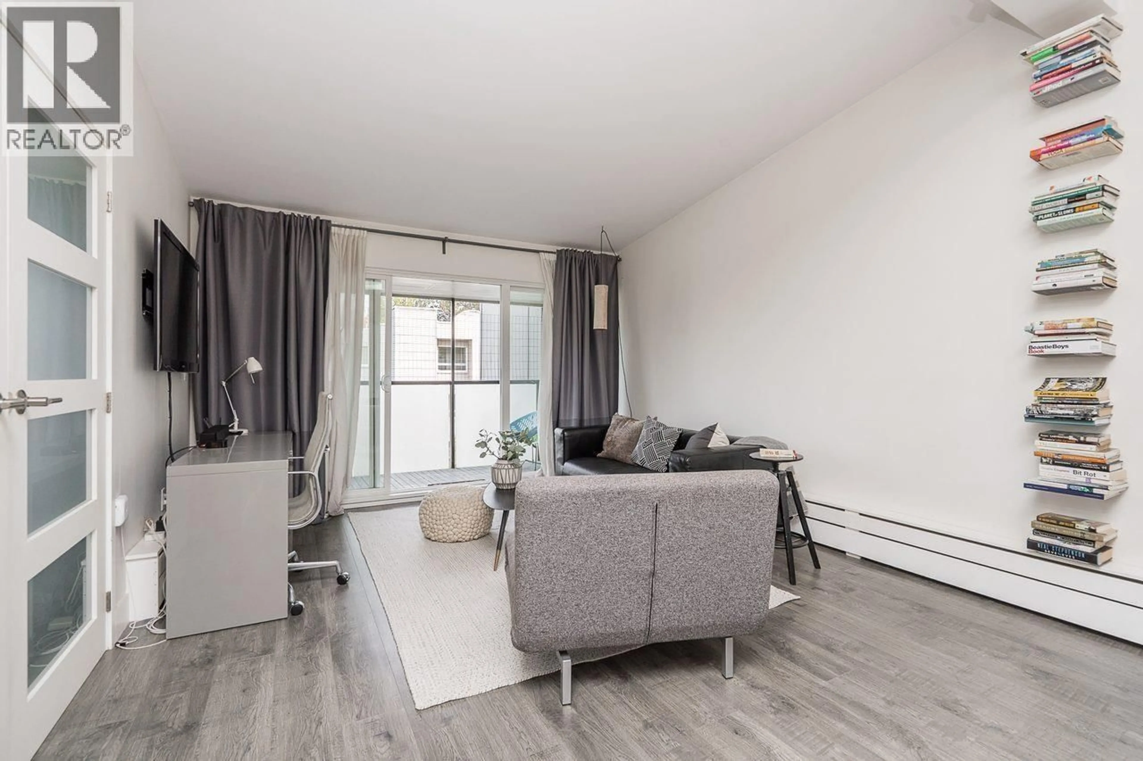 Living room with furniture, unknown for 408 - 2333 TRIUMPH STREET, Vancouver British Columbia V5L1L4