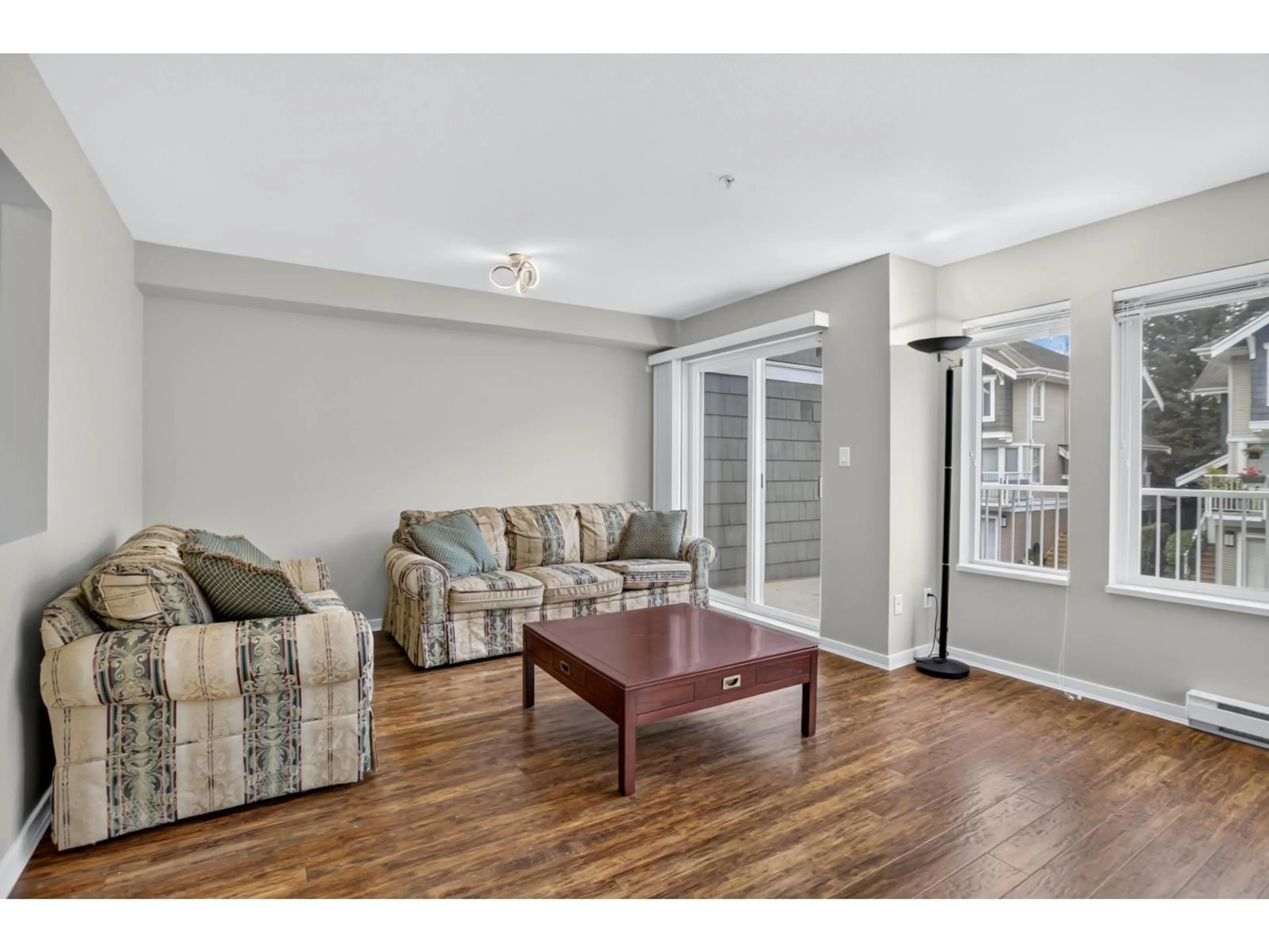 Living room with furniture, wood/laminate floor for 70 - 20760 DUNCAN WAY, Langley British Columbia V3A9J6