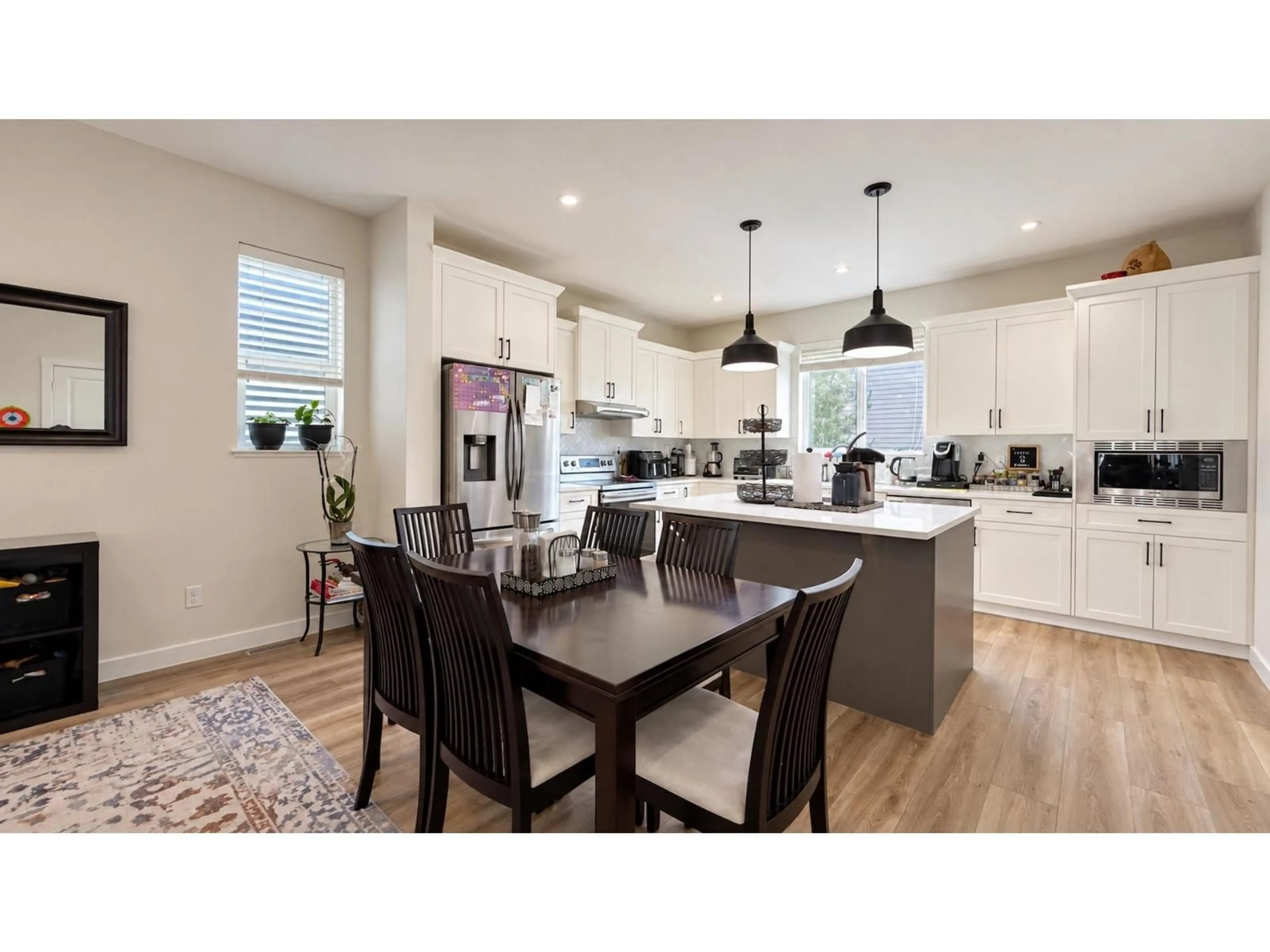 Open concept kitchen, wood/laminate floor for 20298 82A AVENUE, Langley British Columbia V2Y0Z1