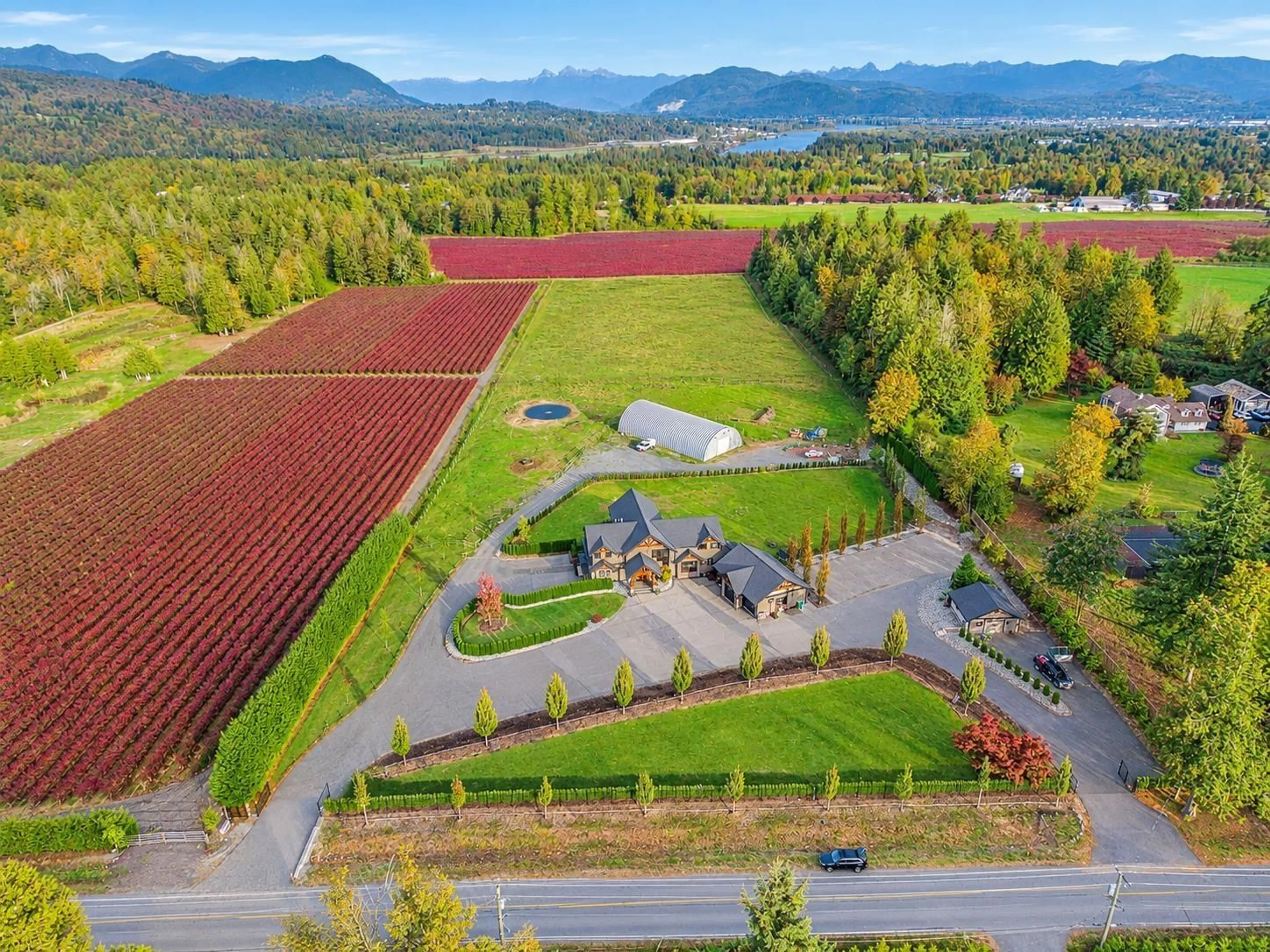 A pic from outside/outdoor area/front of a property/back of a property/a pic from drone, mountain view for 7460 BRADNER ROAD, Abbotsford British Columbia V4X2B6