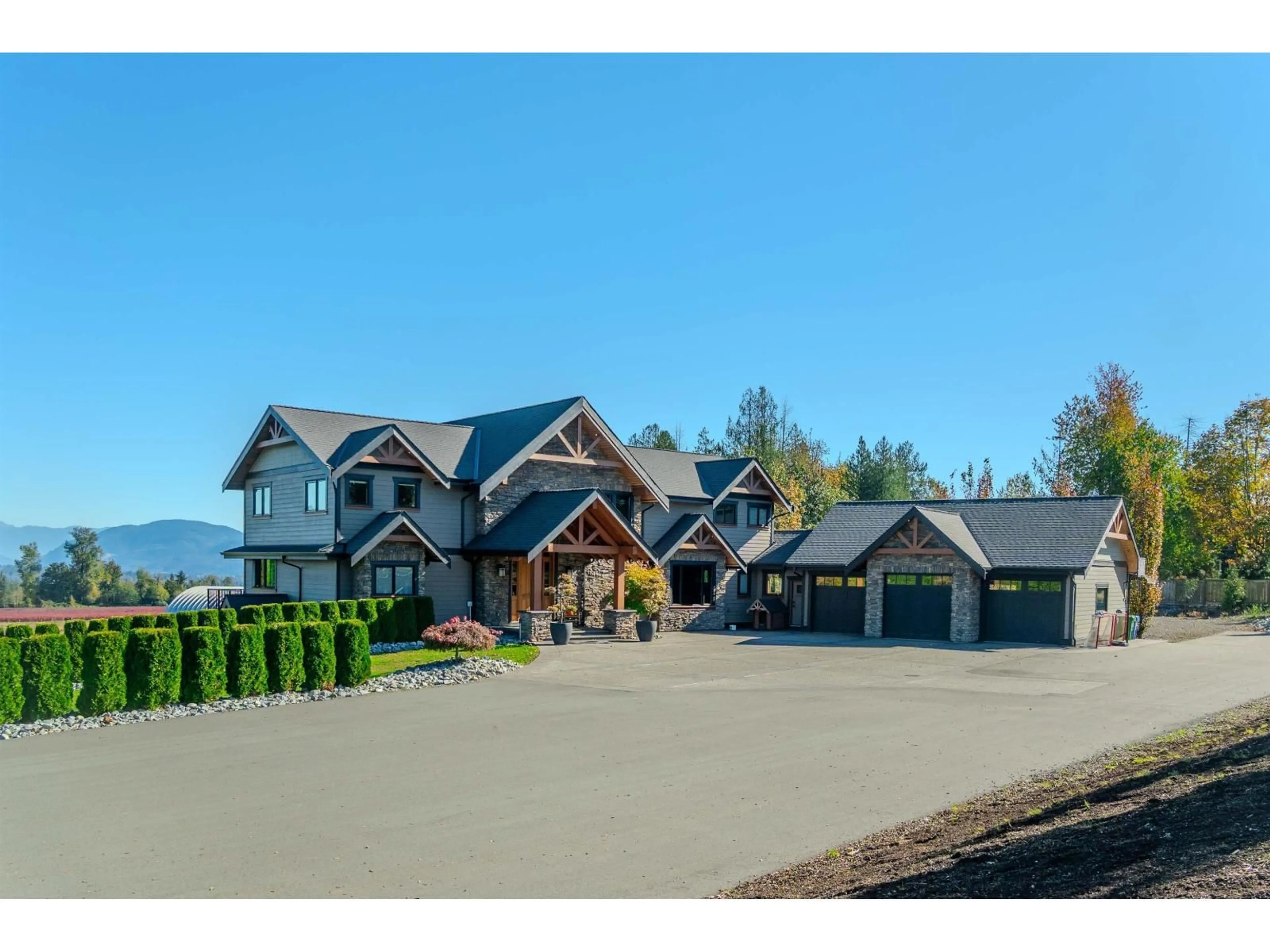 A pic from outside/outdoor area/front of a property/back of a property/a pic from drone, mountain view for 7460 BRADNER ROAD, Abbotsford British Columbia V4X2B6