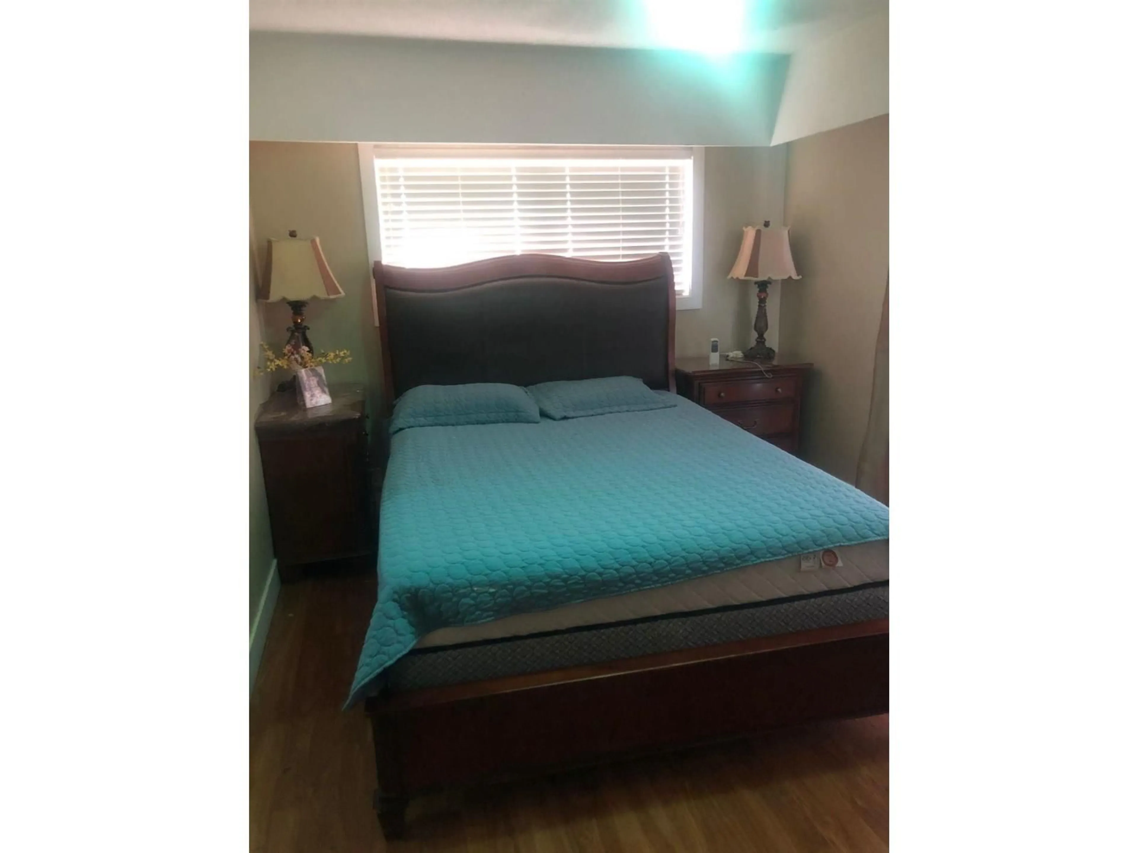 Bedroom with bed, wood/laminate floor for 14355 72 AVENUE, Surrey British Columbia V3W2P9