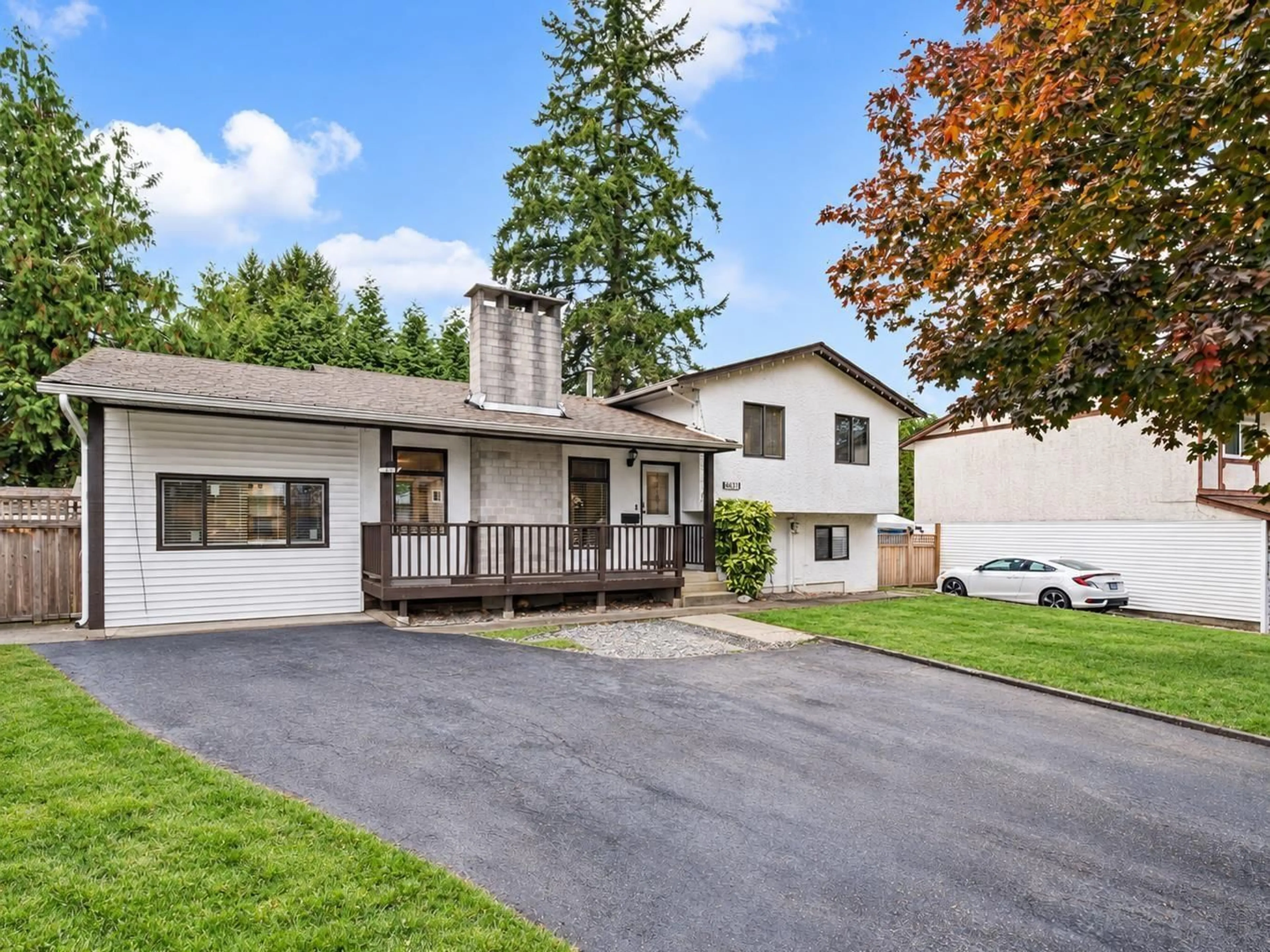 Home with vinyl exterior material, street for 4851 206 STREET, Langley British Columbia V3A2C1