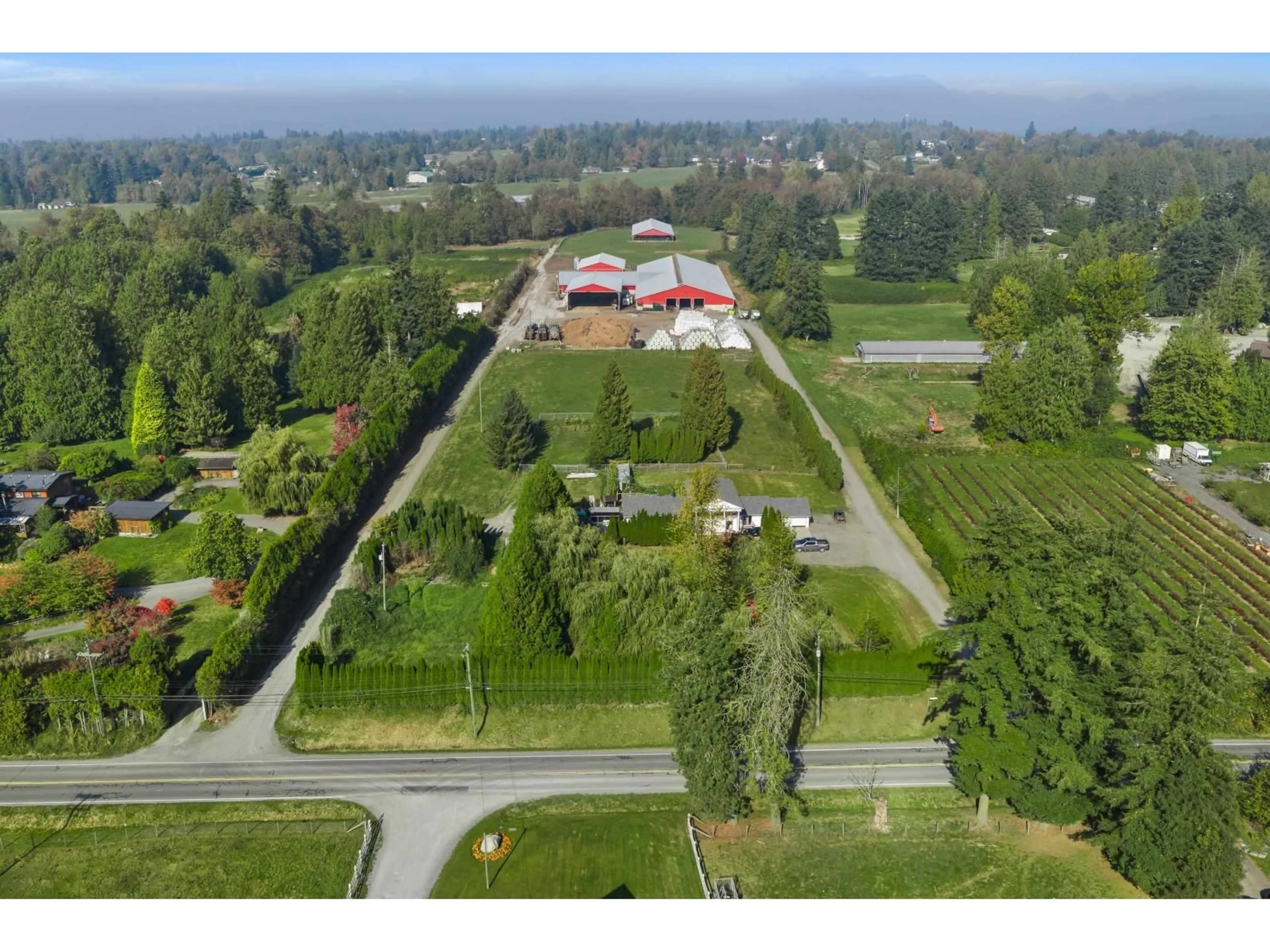 A pic from outside/outdoor area/front of a property/back of a property/a pic from drone, mountain view for 28677 58 AVENUE, Abbotsford British Columbia V4X2E8