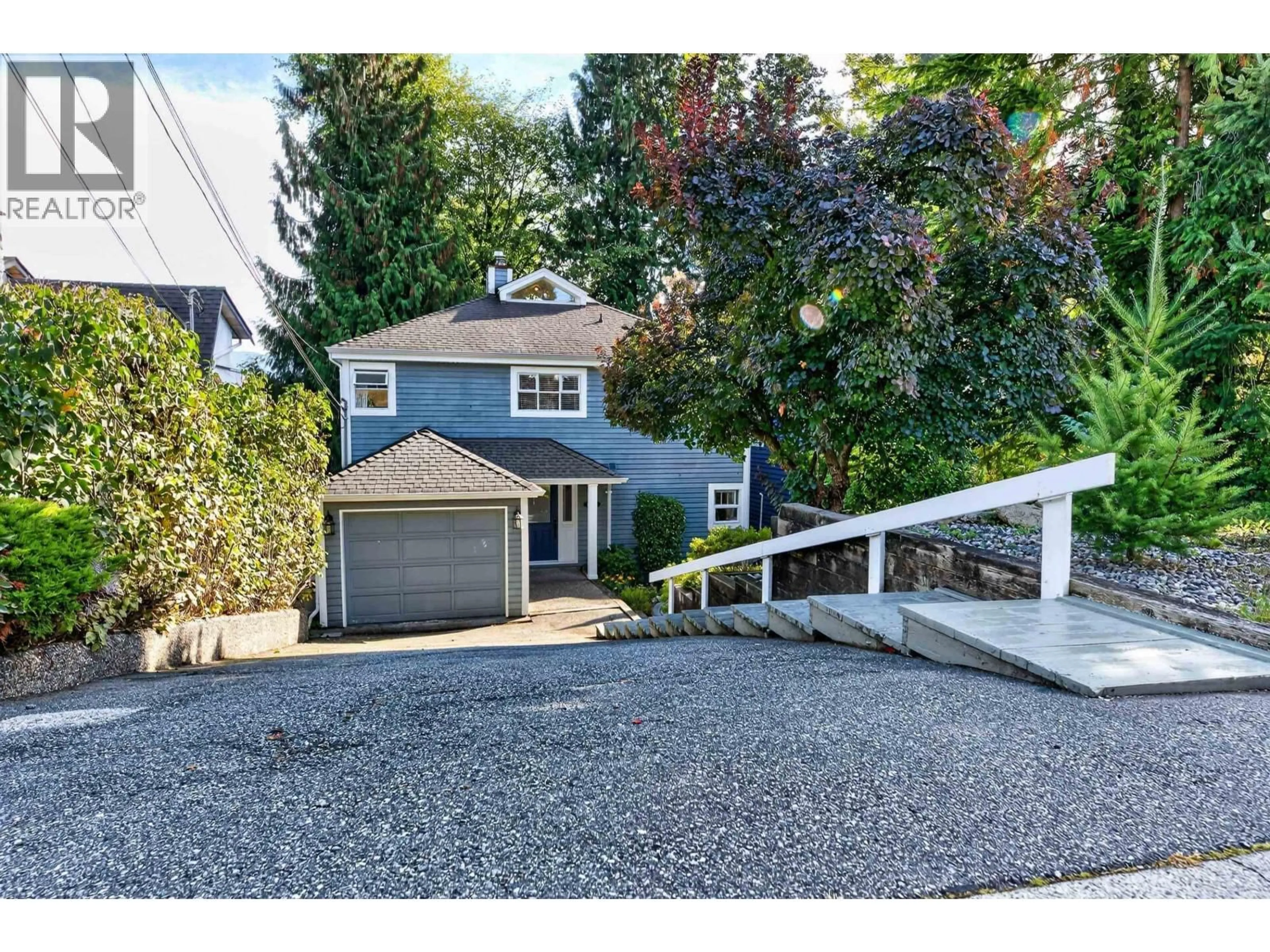 A pic from outside/outdoor area/front of a property/back of a property/a pic from drone, street for 1150 BEAUFORT ROAD, North Vancouver British Columbia V7G1R7