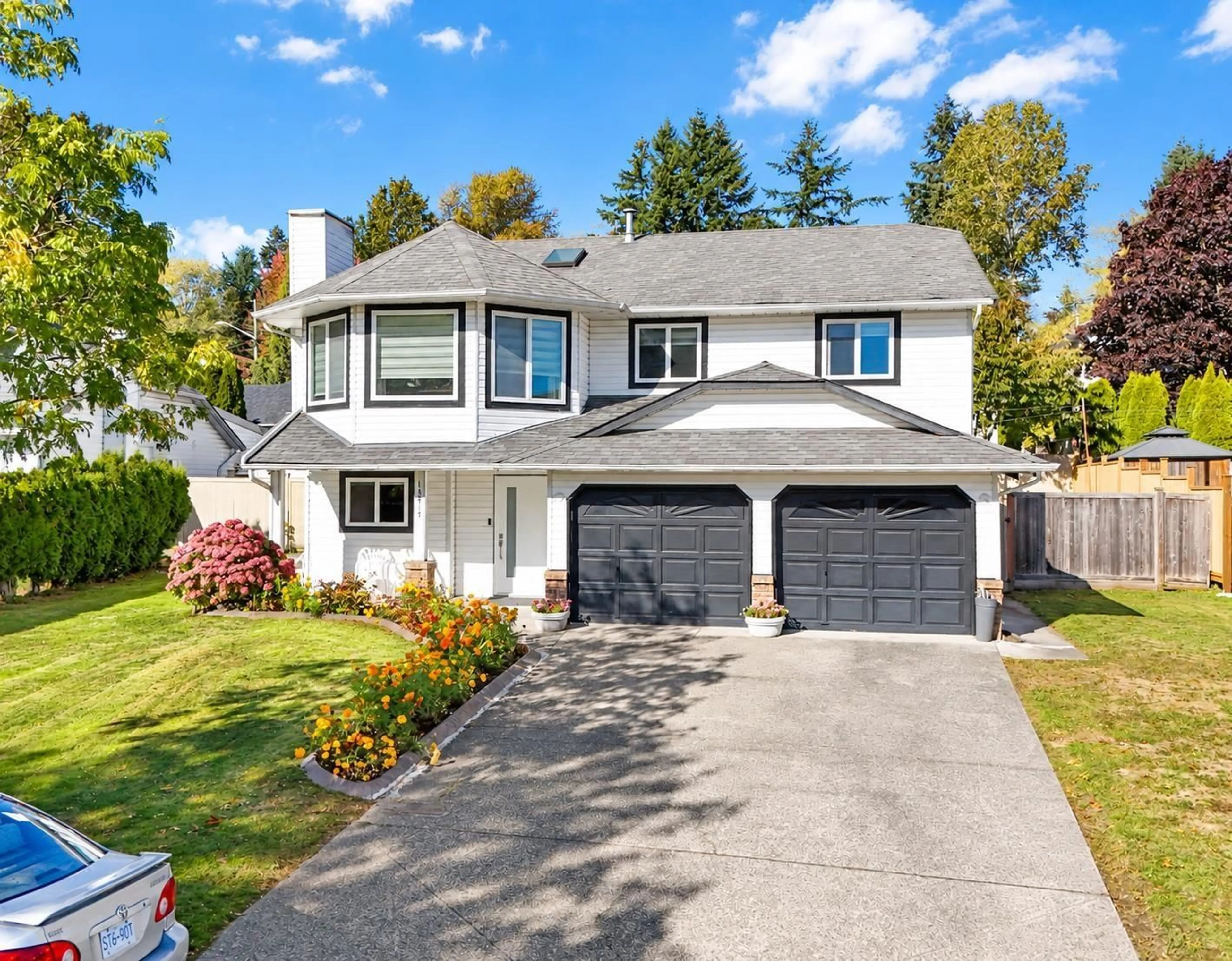 Home with vinyl exterior material, street for 14217 67 AVENUE, Surrey British Columbia V3W0P5