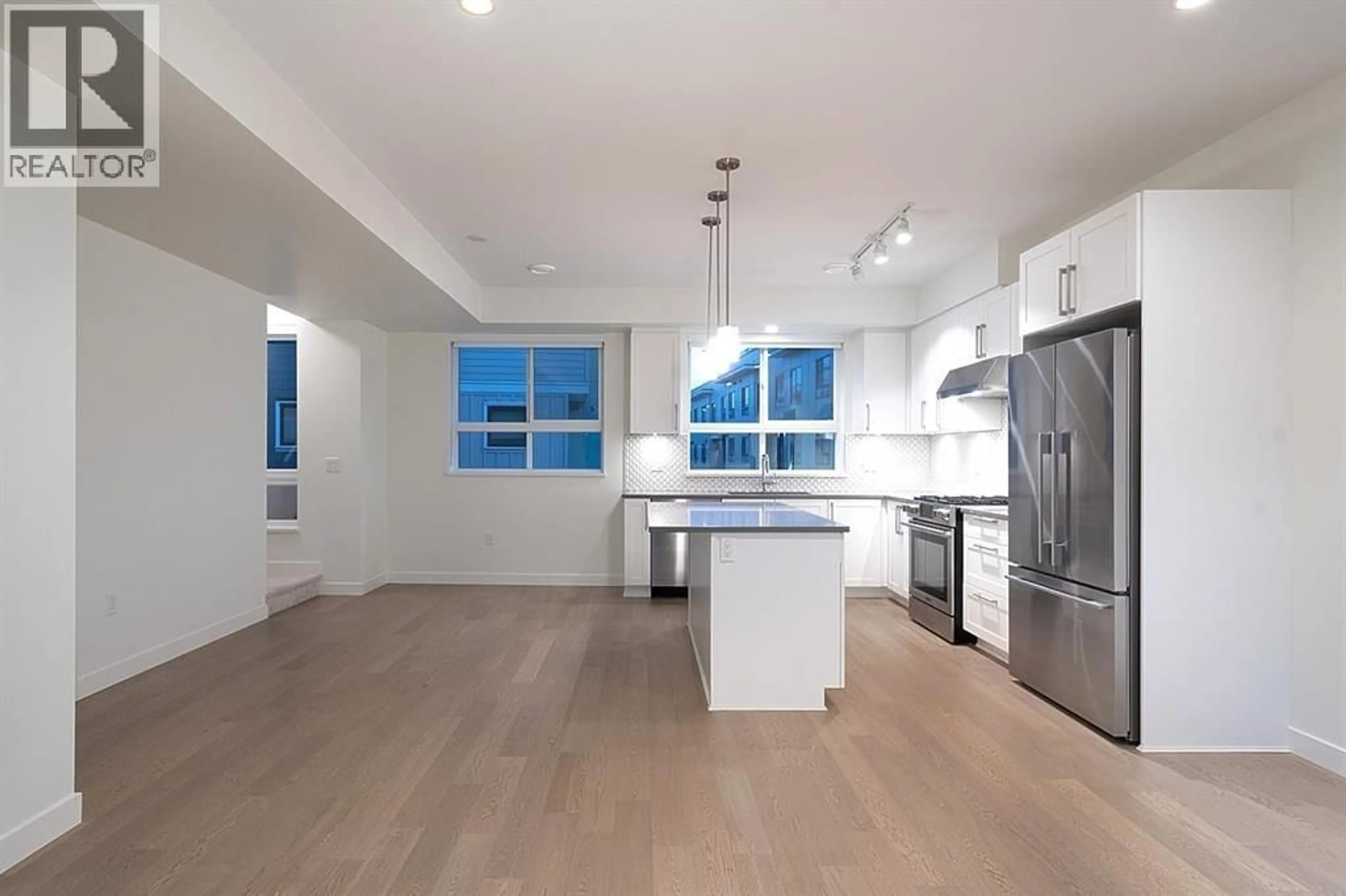 Open concept kitchen, wood/laminate floor for 36 - 10233 RIVER DRIVE, Richmond British Columbia V6X0T7