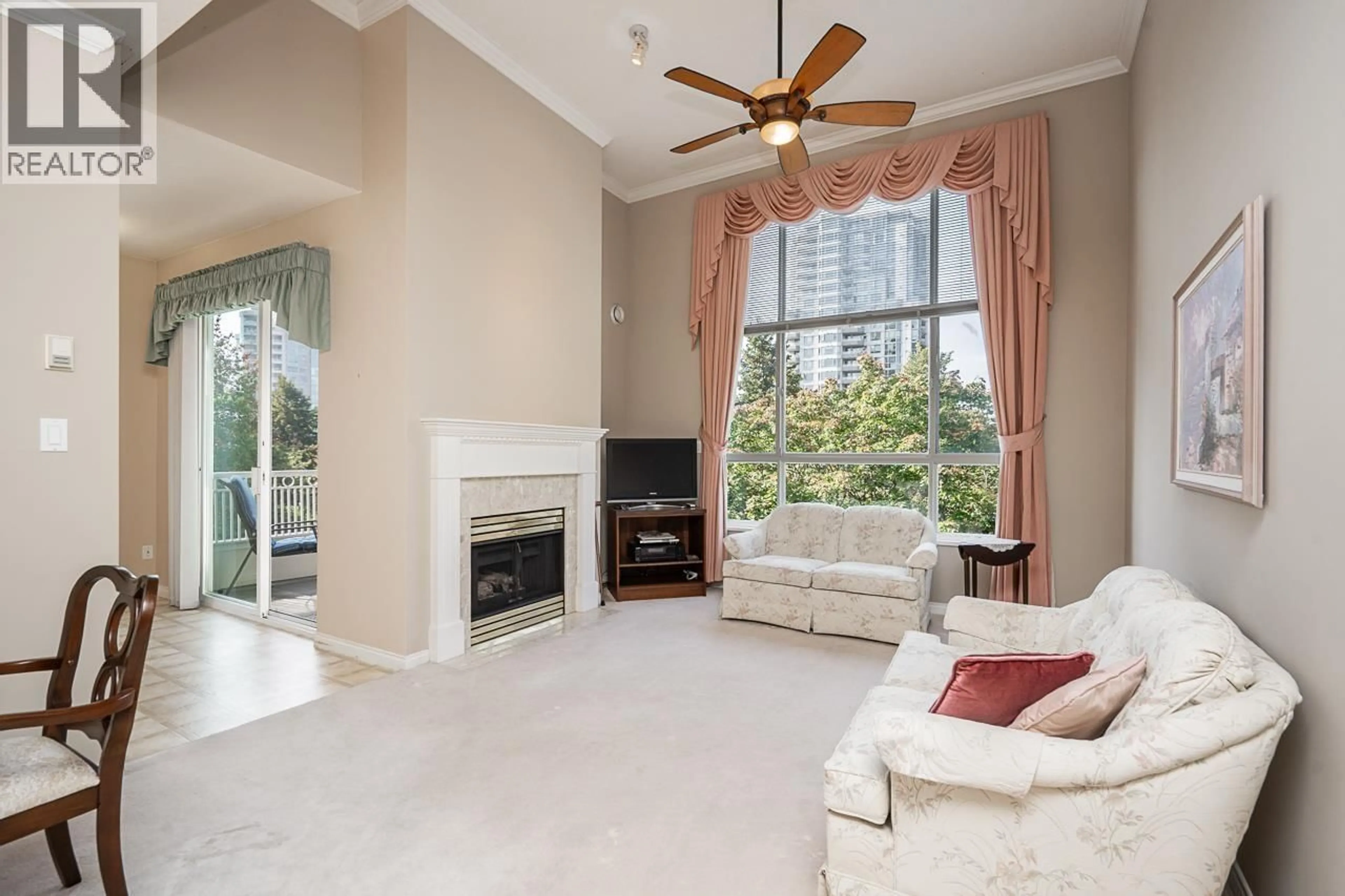 Living room with furniture, unknown for 411 - 3098 GUILDFORD WAY, Coquitlam British Columbia V3B7W8