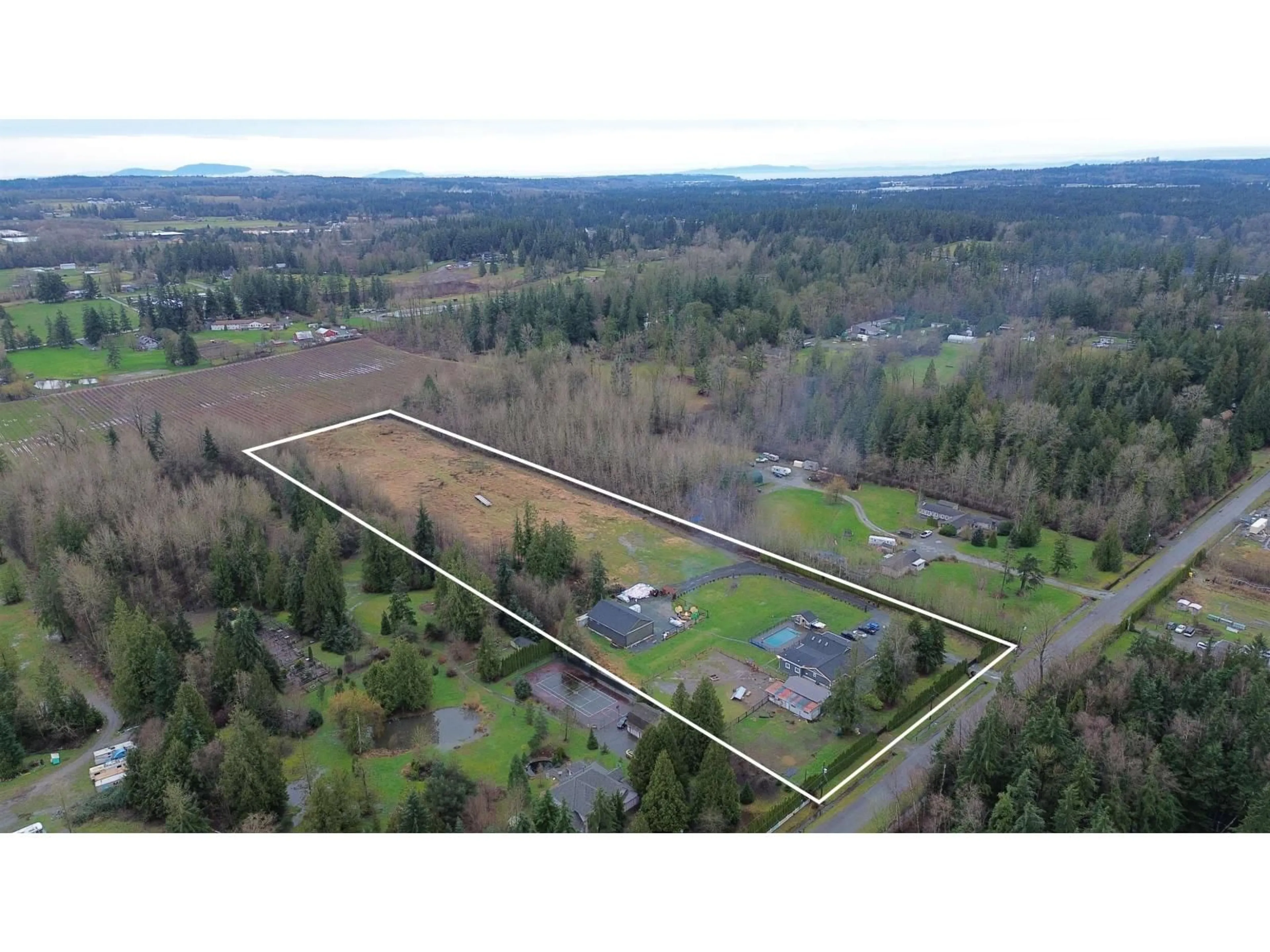 A pic from outside/outdoor area/front of a property/back of a property/a pic from drone, unknown for 21298 36 AVENUE, Langley British Columbia V3A8N6
