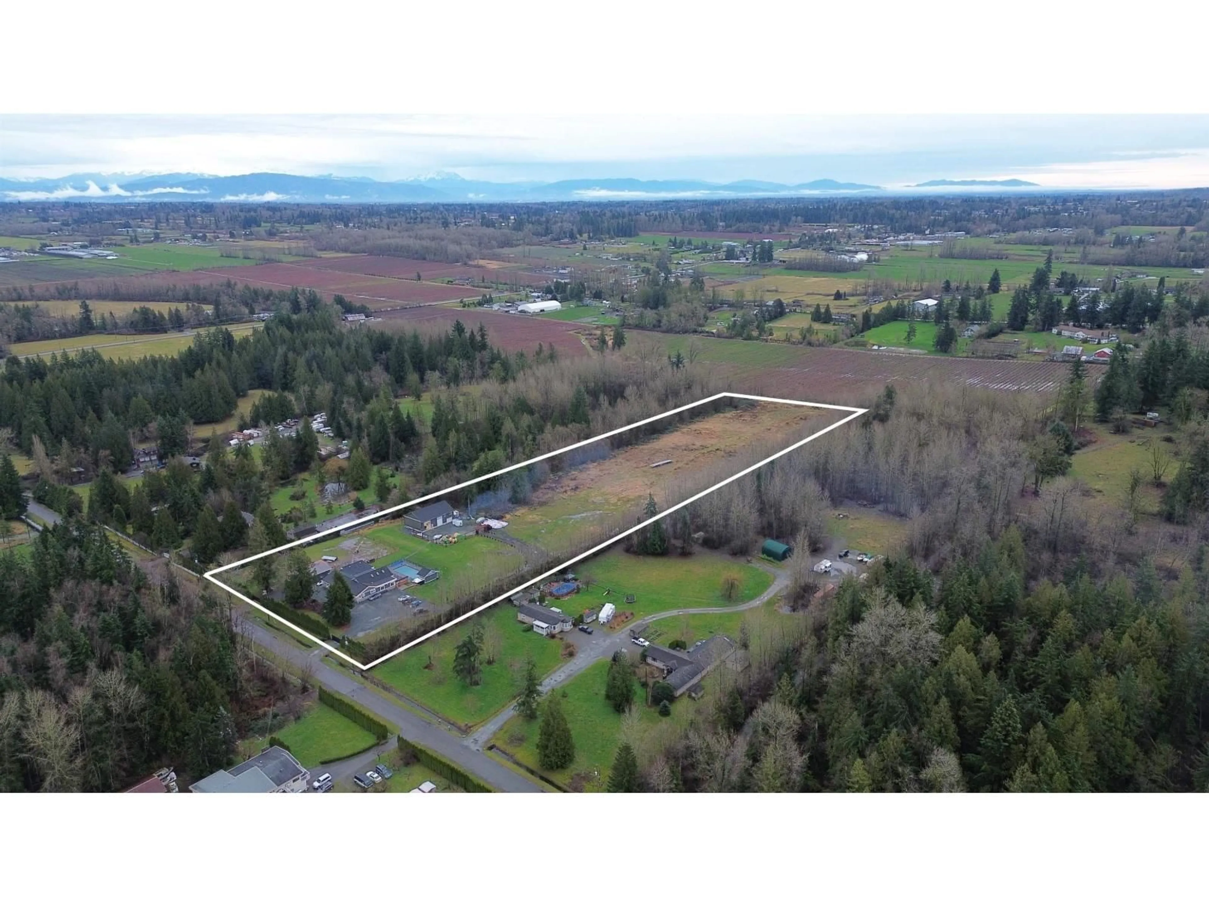 A pic from outside/outdoor area/front of a property/back of a property/a pic from drone, water/lake/river/ocean view for 21298 36 AVENUE, Langley British Columbia V3A8N6