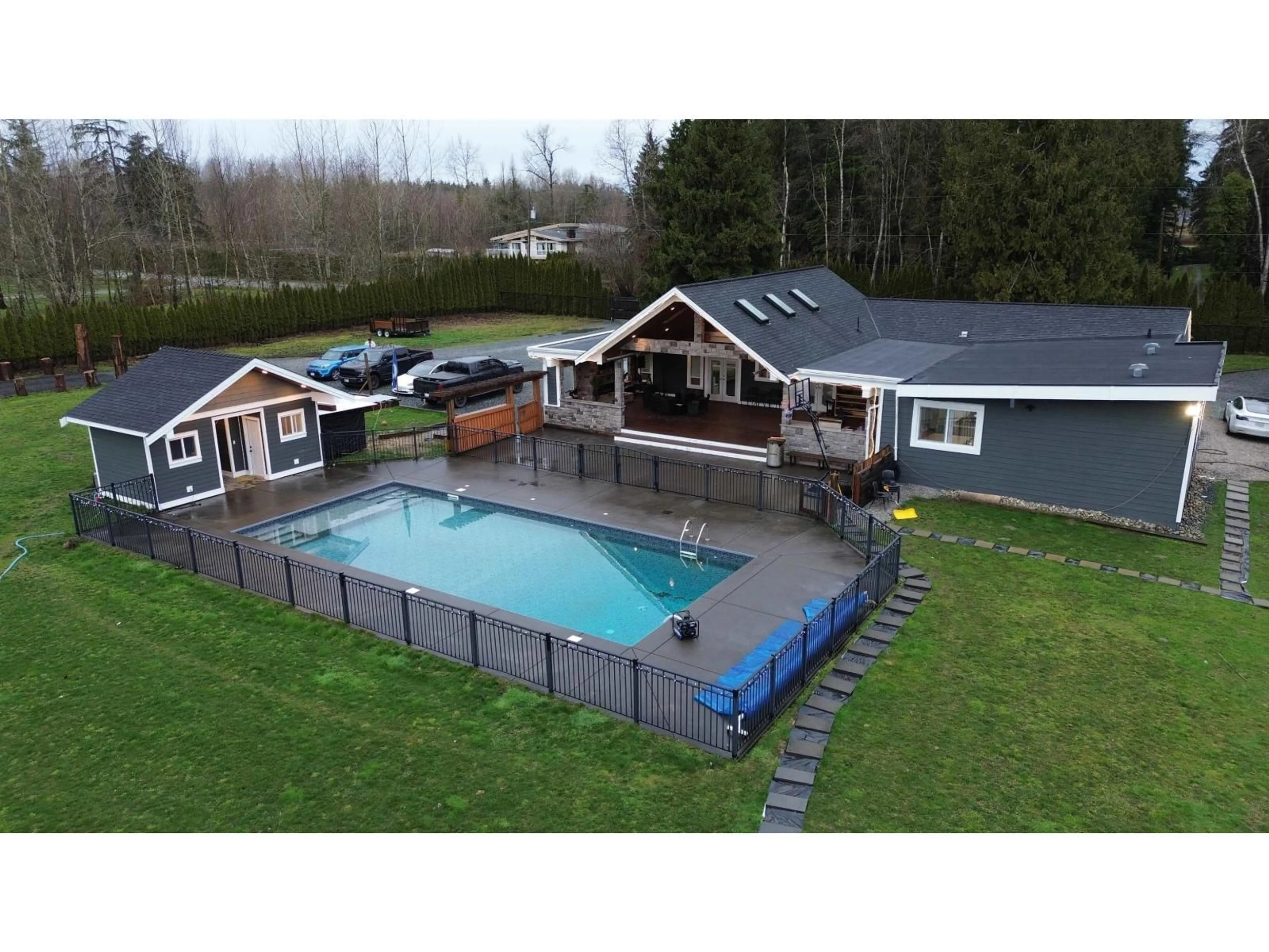 A pic from outside/outdoor area/front of a property/back of a property/a pic from drone, water/lake/river/ocean view for 21298 36 AVENUE, Langley British Columbia V3A8N6