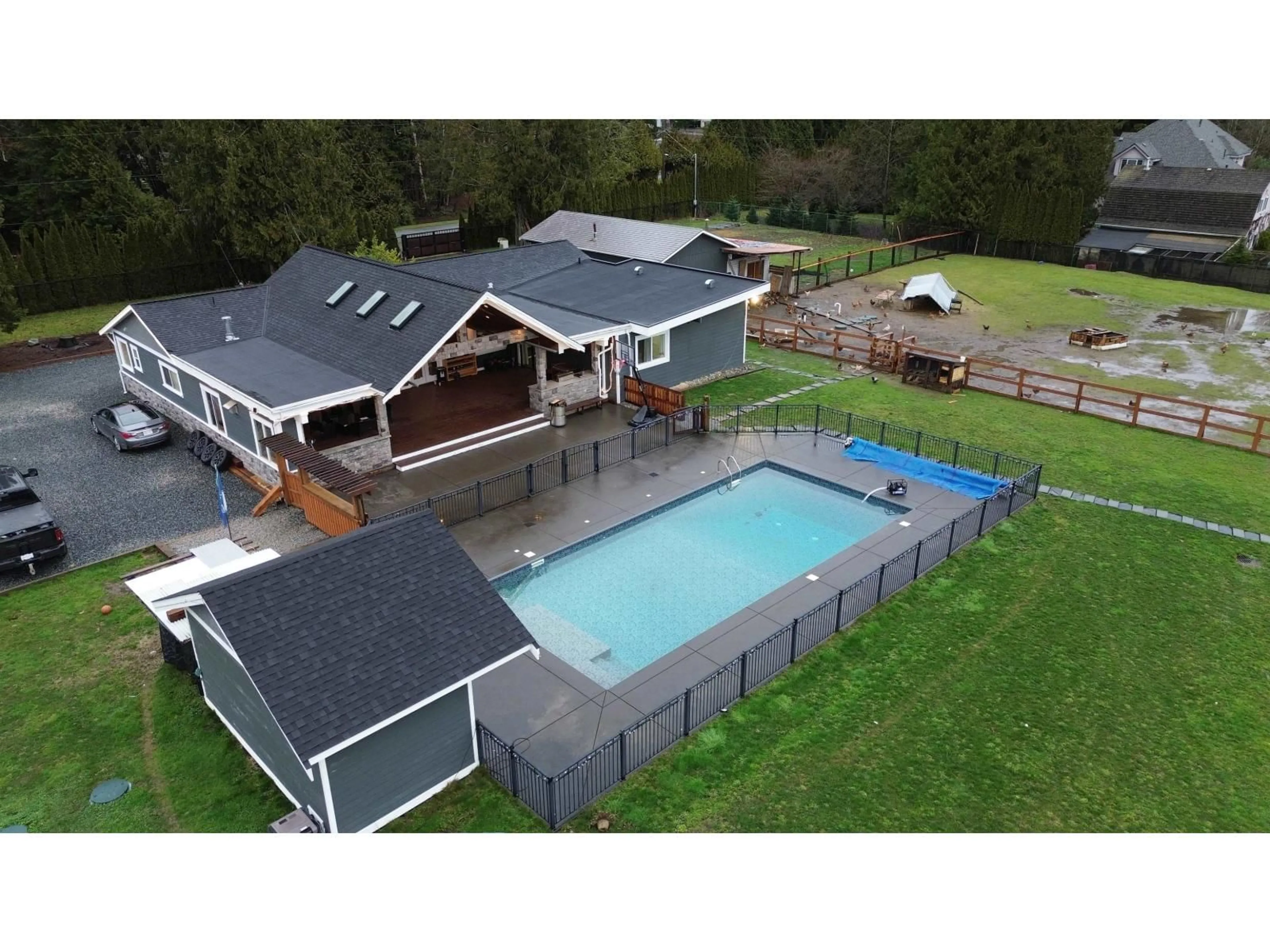 A pic from outside/outdoor area/front of a property/back of a property/a pic from drone, water/lake/river/ocean view for 21298 36 AVENUE, Langley British Columbia V3A8N6