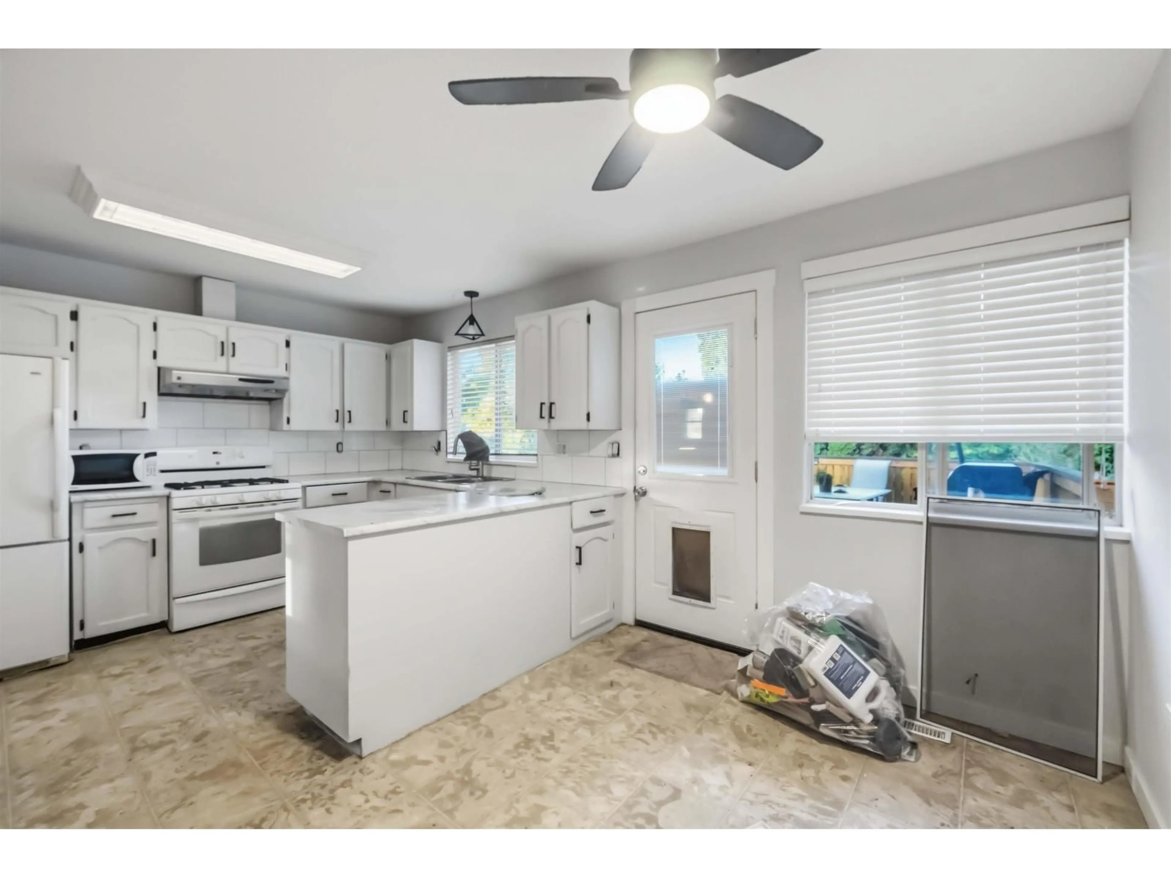 Open concept kitchen, ceramic/tile floor for 3743 NANAIMO CRESCENT, Abbotsford British Columbia V2T4Z7