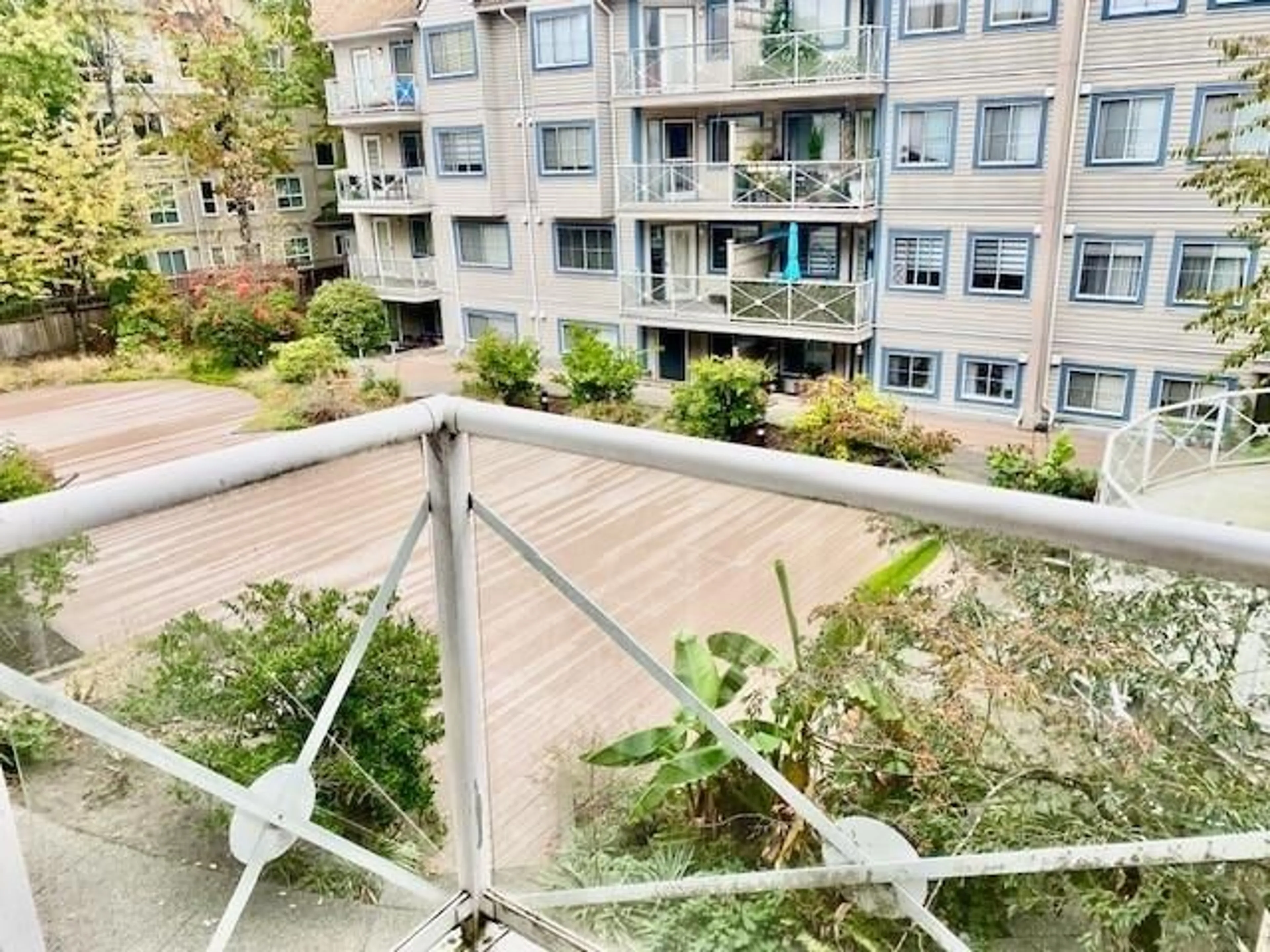 Balcony in the apartment, city buildings view from balcony for 327 - 12101 80 AVENUE, Surrey British Columbia V3W5V6
