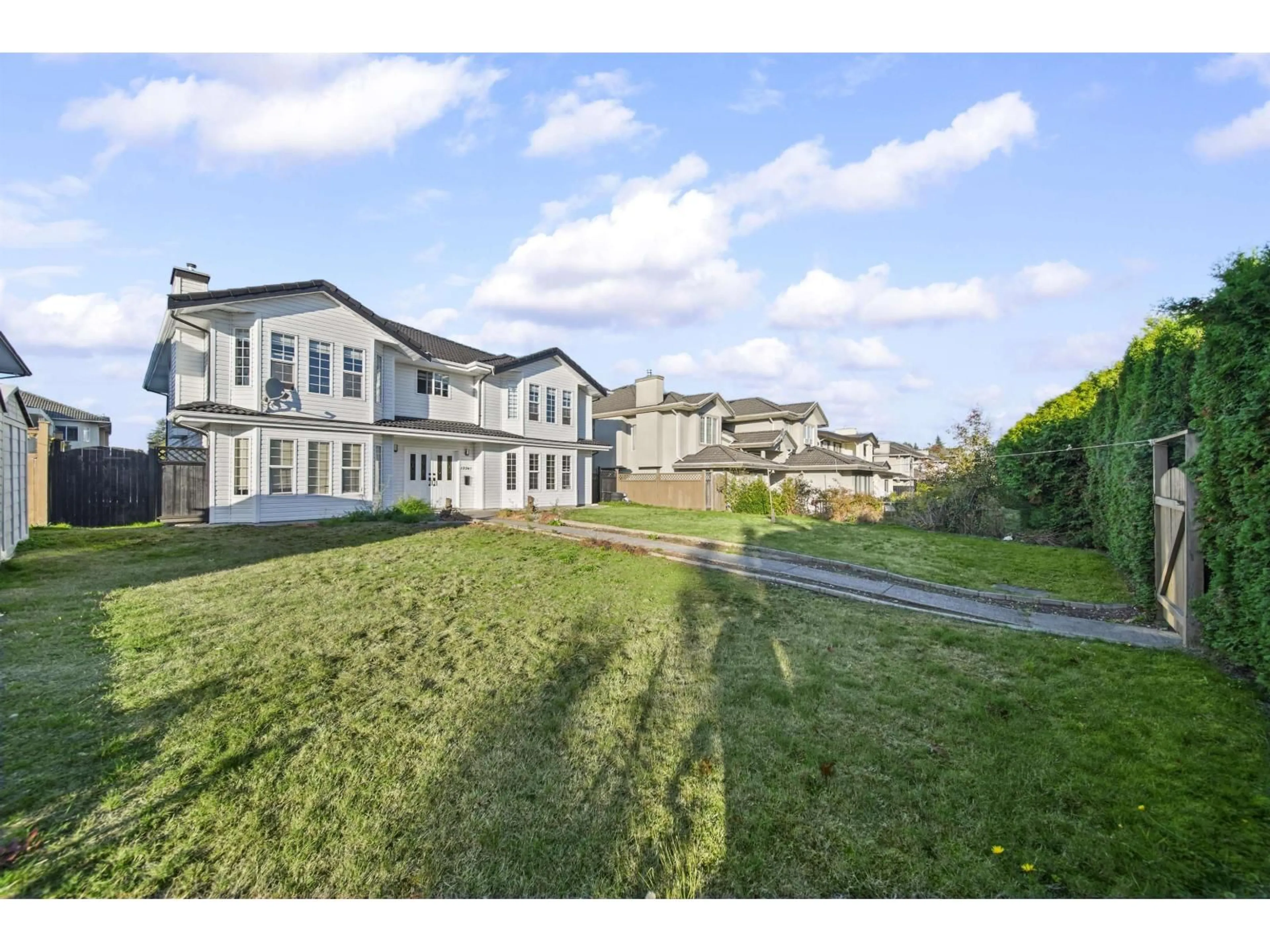 A pic from outside/outdoor area/front of a property/back of a property/a pic from drone, unknown for 12247 64 AVENUE, Surrey British Columbia V3W1W6