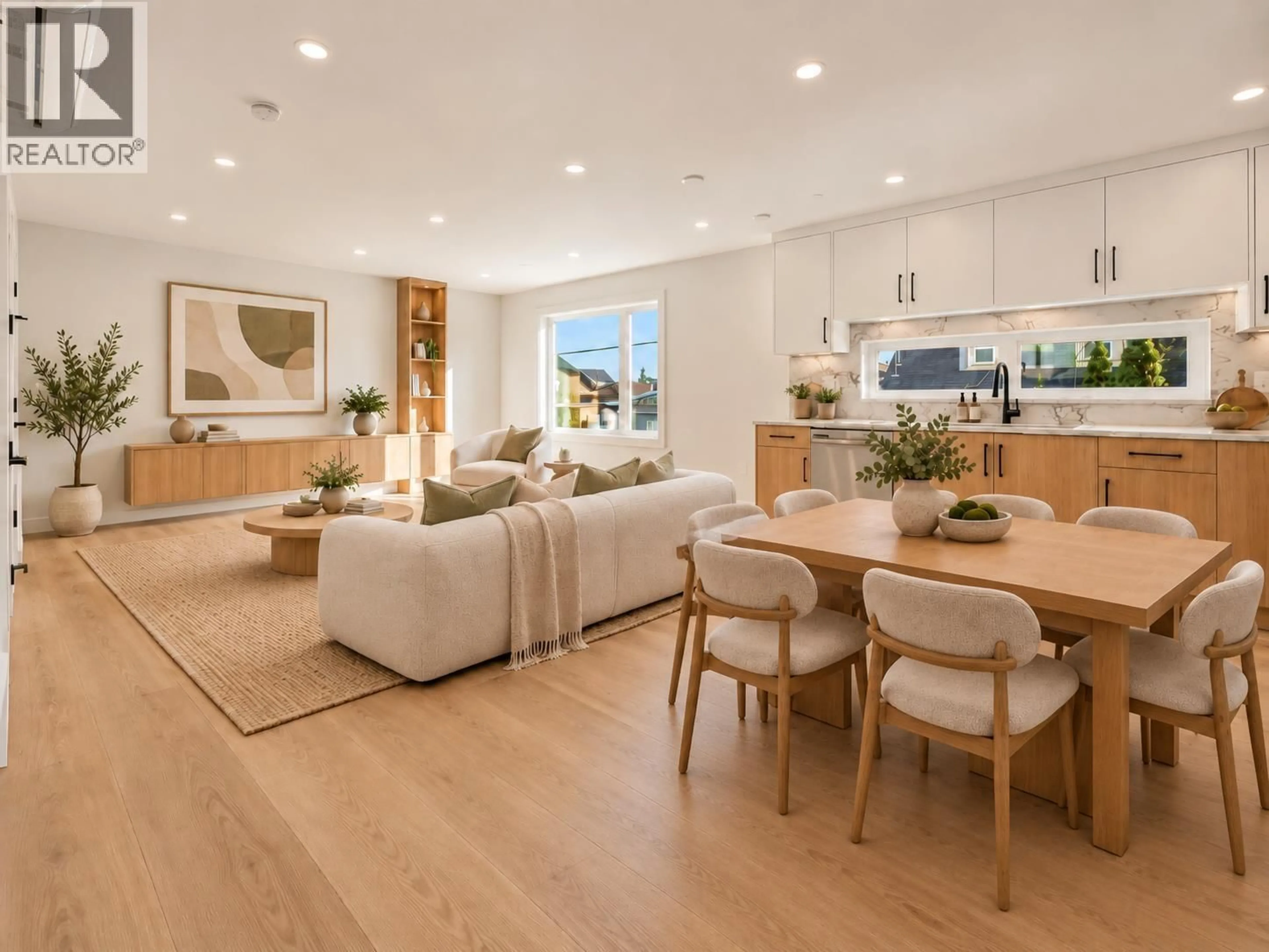 Open concept kitchen, wood/laminate floor for 3036 5TH AVENUE, Vancouver British Columbia V5M1N8