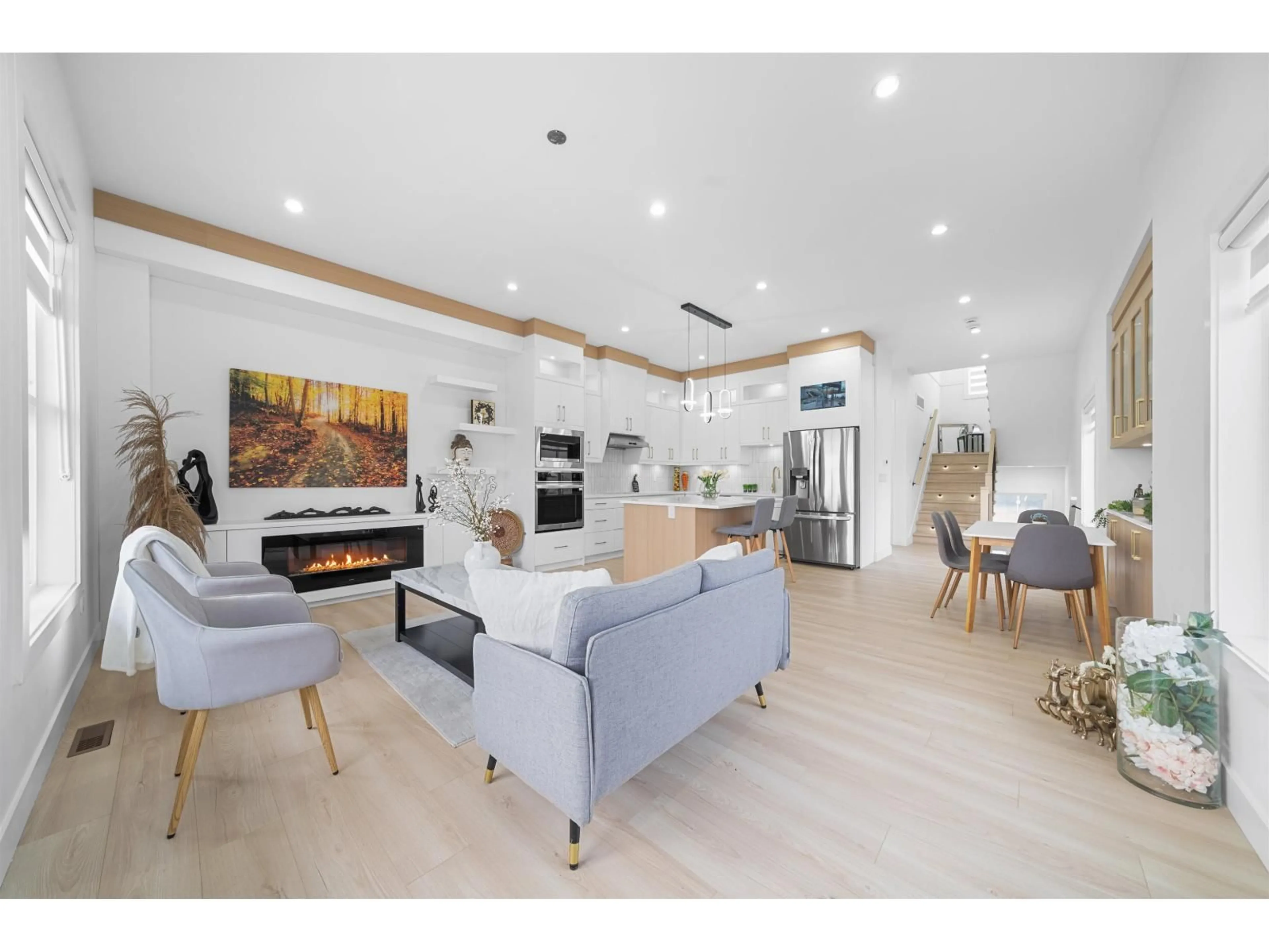 Living room with furniture, wood/laminate floor for 101 - 8148 168 STREET, Surrey British Columbia V4N4Y8